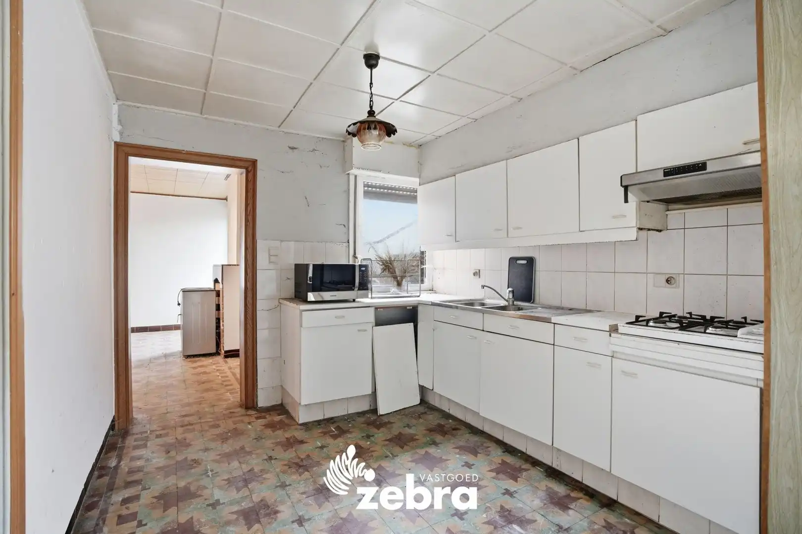 Te renoveren woning op een rustige ligging te Zwevezele! foto 6