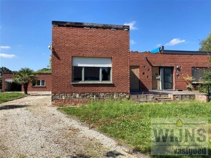 Veelzijdig renovatieproject met enorm potentieel op gunstige ligging foto 10