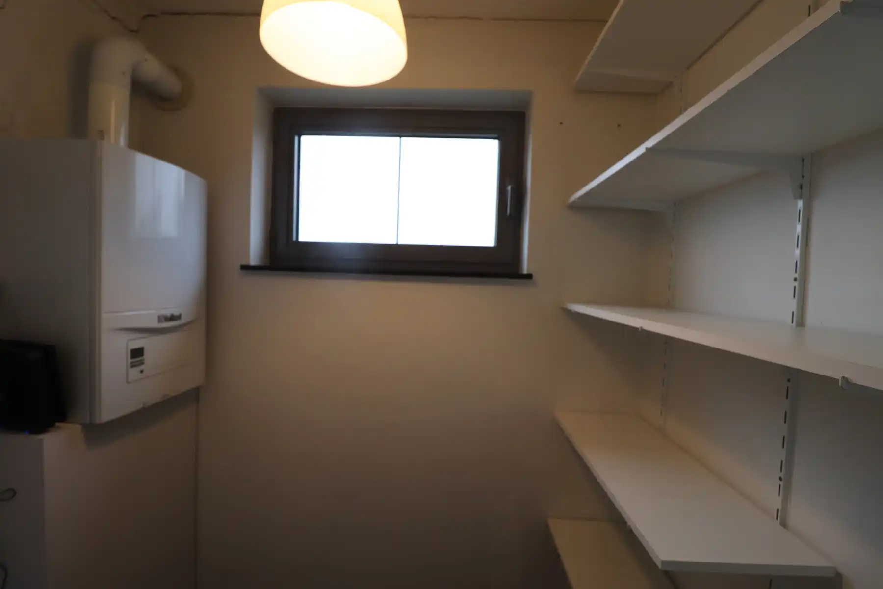 Een appartement op de tweede verdieping achteraan met 1 slaapkamer, terras en garage. foto 11