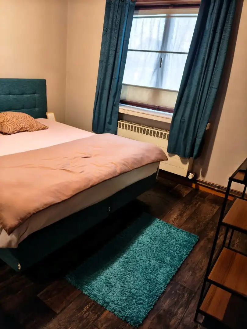 Ruime woning met 4 slaapkamers en garage en carport en tuin foto 13