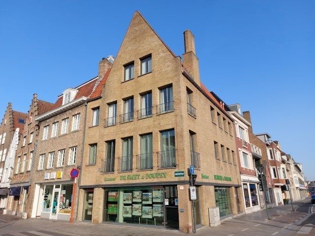 Rijwoning met tuin met uitweg foto 9