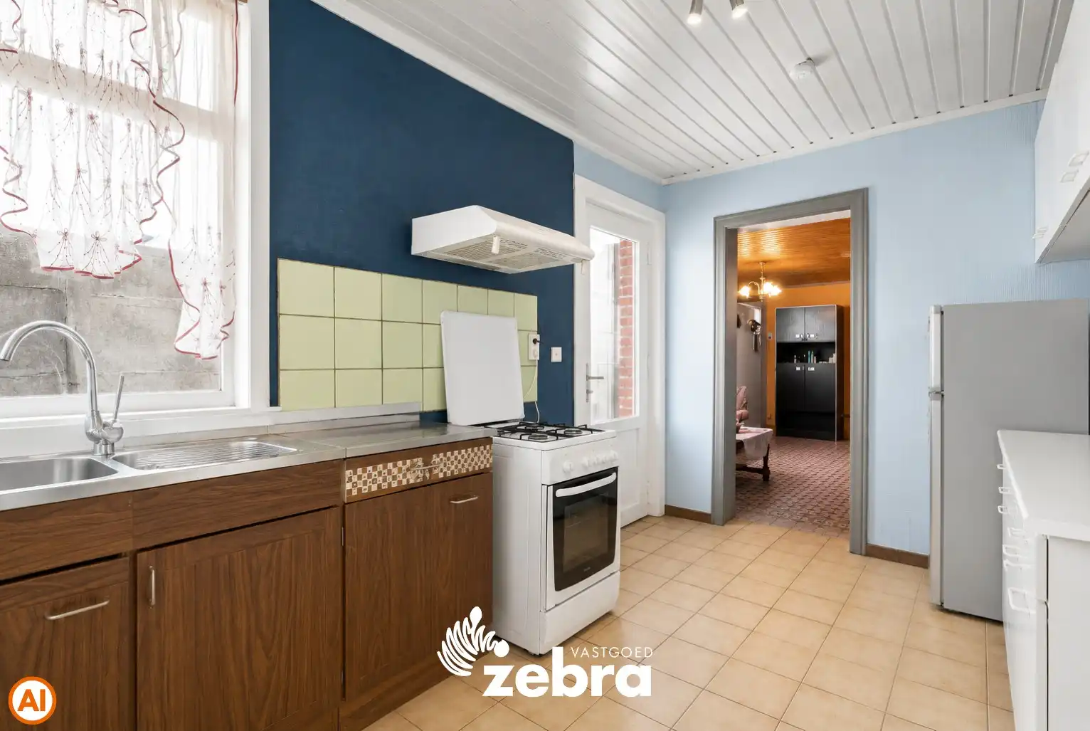 Te renoveren woning met 3 slaapkamers, kelder en zuidwestgerichte stadskoer in Tielt! foto 8