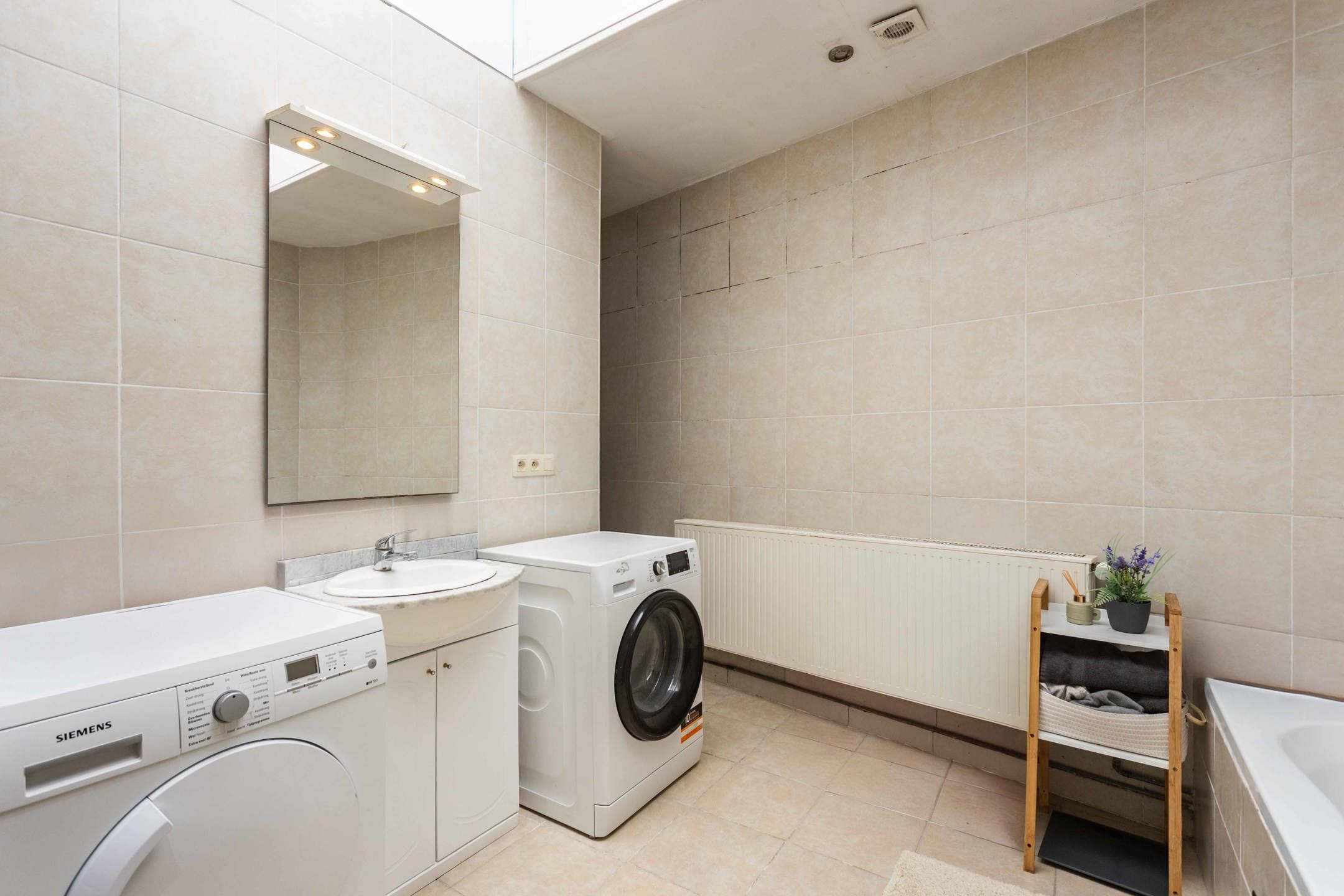 Interessante investering: verhuurde woning vlakbij centrum. foto 8