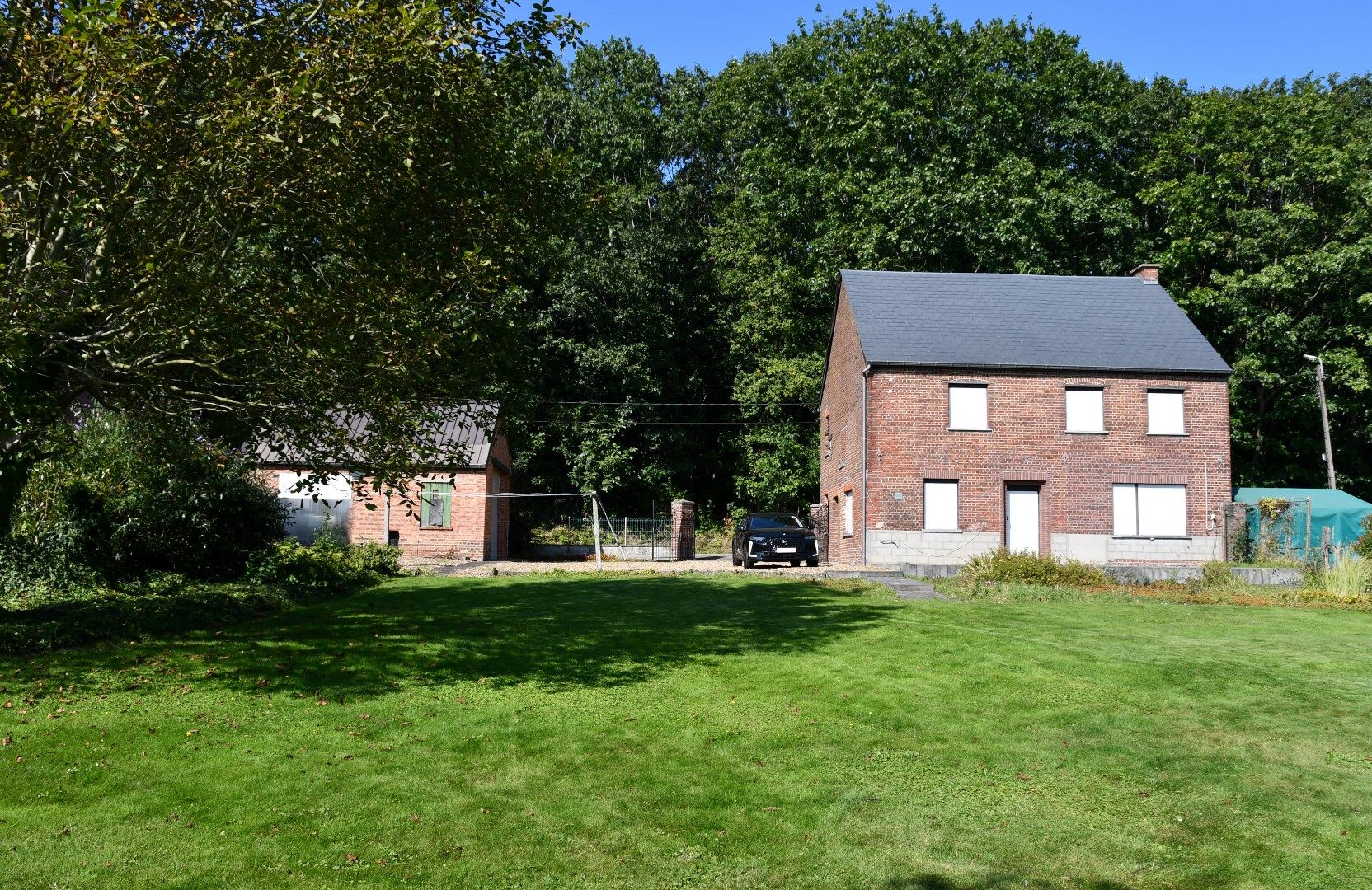 Charmante, te moderniseren woning in het groene Attenrode foto 30