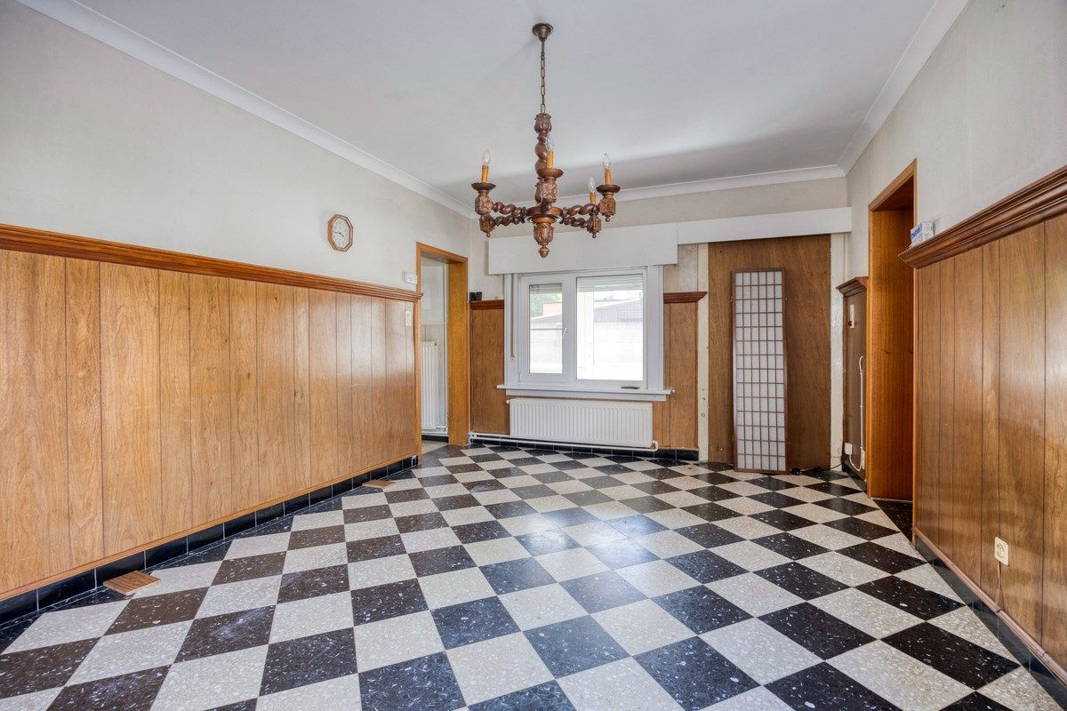 Ruim ingedeelde woning met 3slpks op een gunstige ligging. foto 6