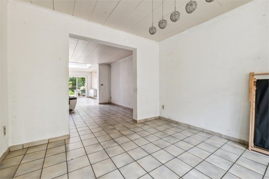 KNUSSE GEZINSWONING MET GEZELLIGE STADSTUIN IN HASSELT foto 5