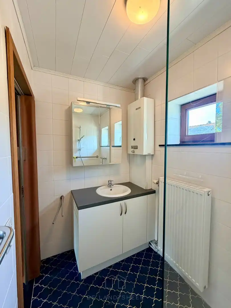 Te renoveren halfopen bebouwing met 3 slaapkamers in hartje Bornem - Een woning met potentieel! foto 21