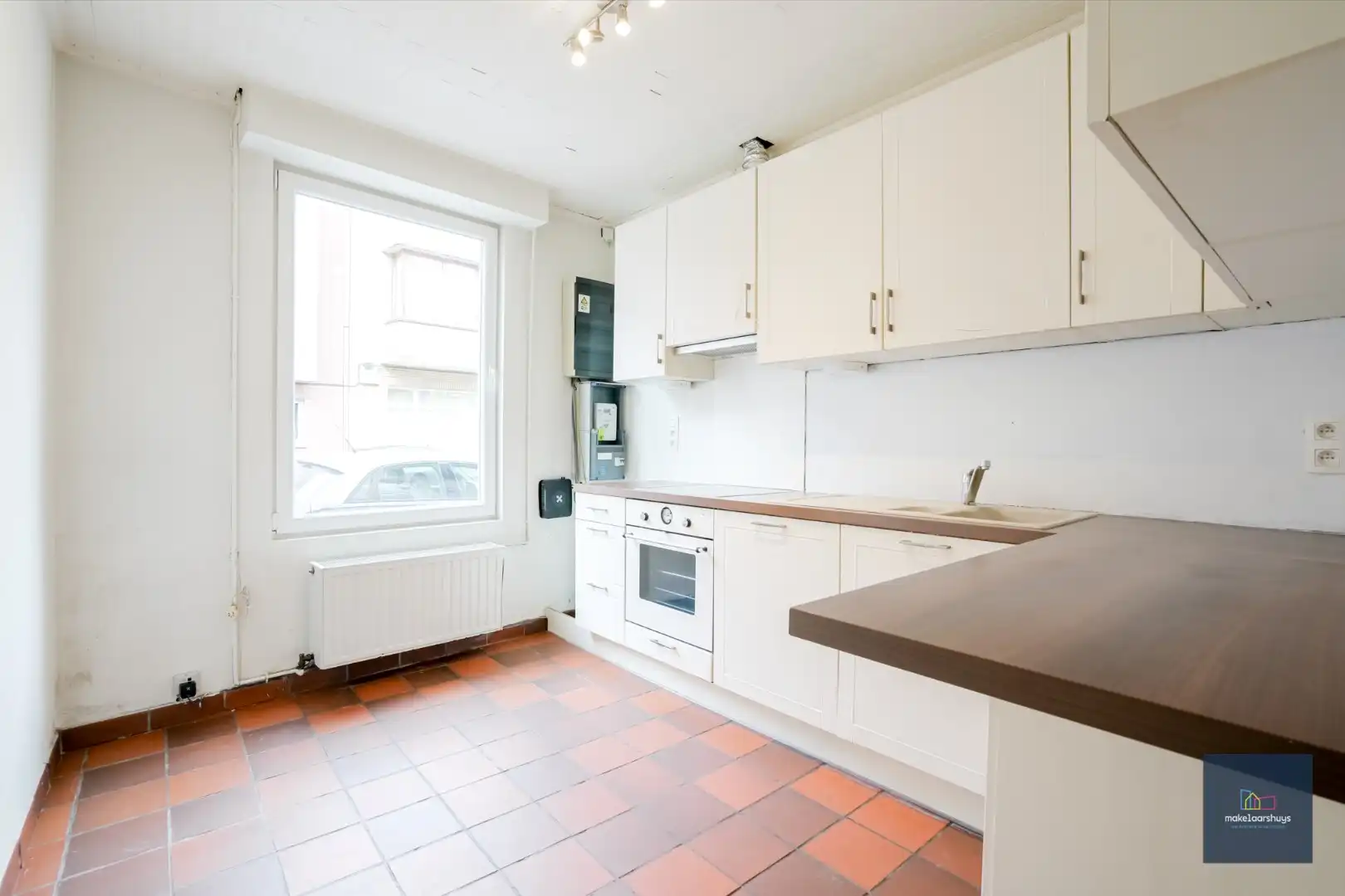 Gunstig gelegen woning in rij met zonnige stadstuin foto 3