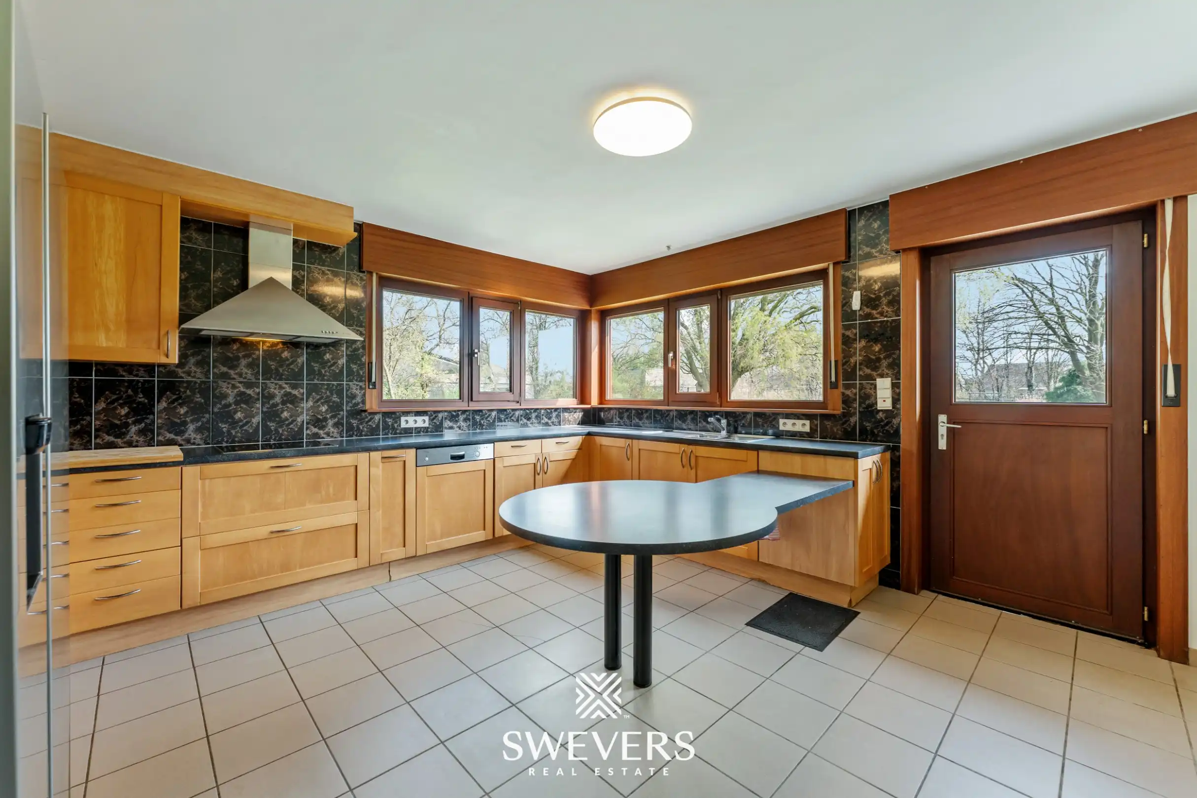 Zeer ruime woning met praktijkruimte op 28a 69ca in Heusden-Zolder foto 10