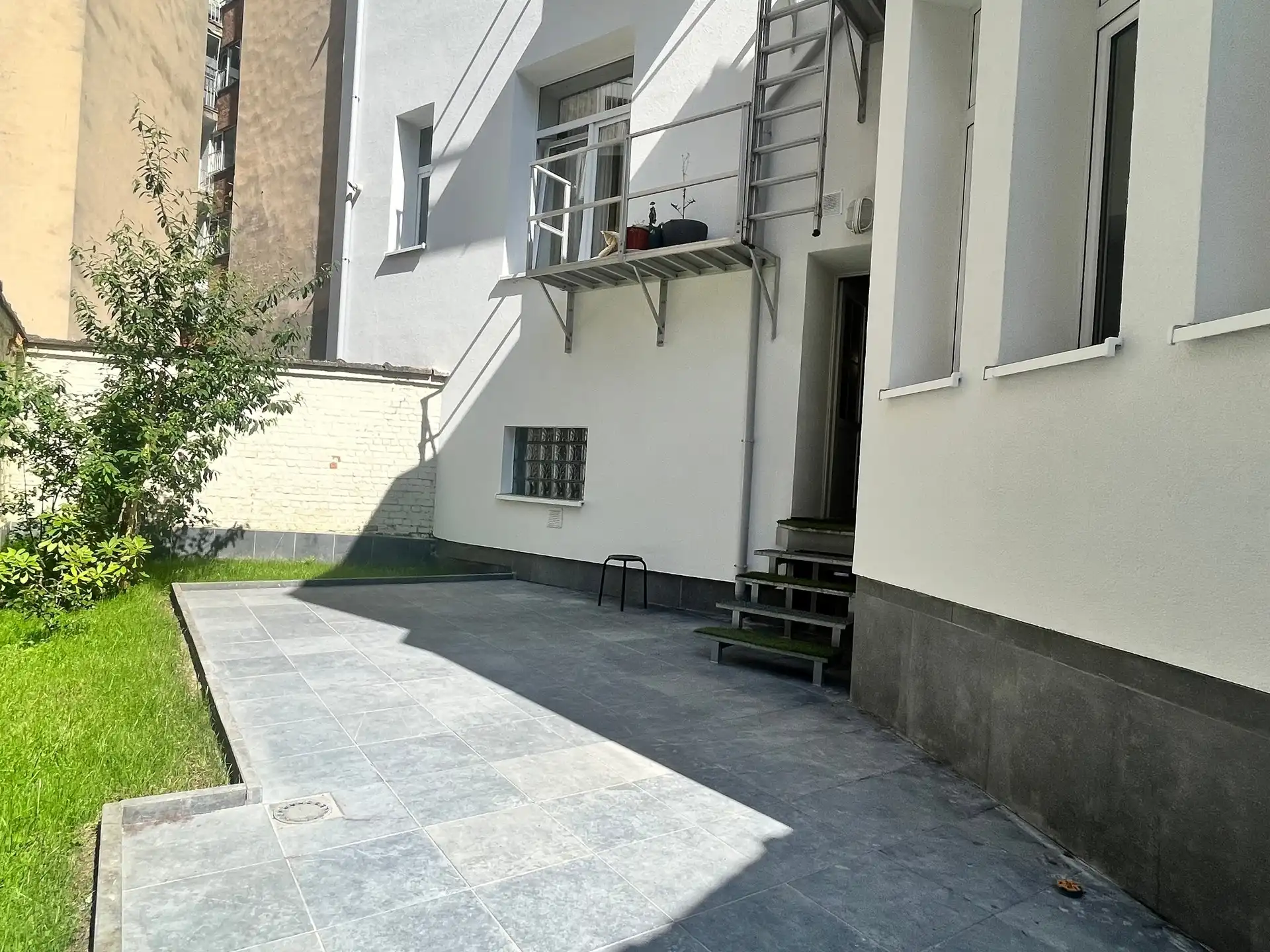 Gelijkvloers appartement met ruime stadstuin! foto 5