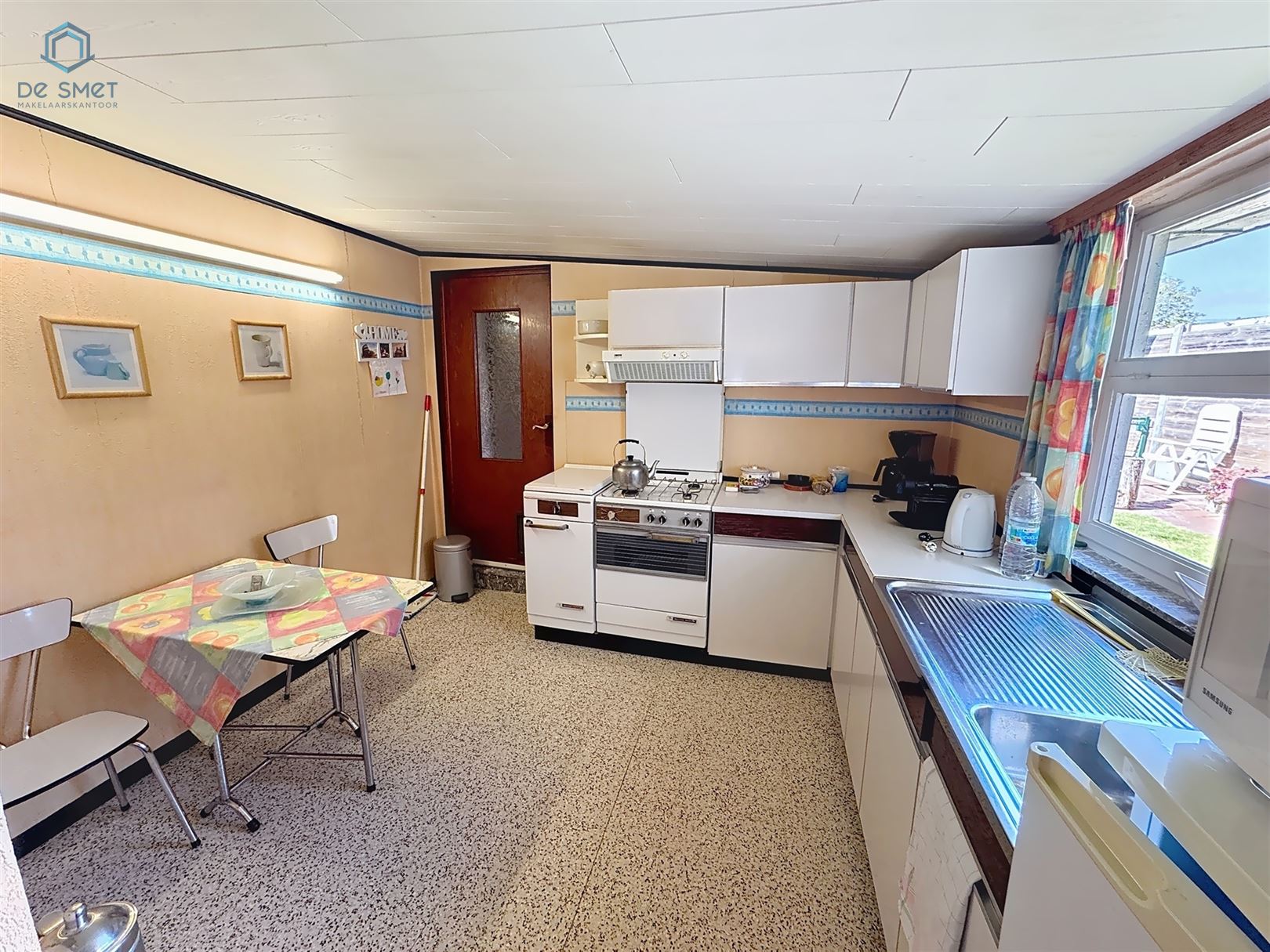 Veelzijdige Te Renoveren Woning met Handelsruimte in het Hart van Schendelbeke foto 9