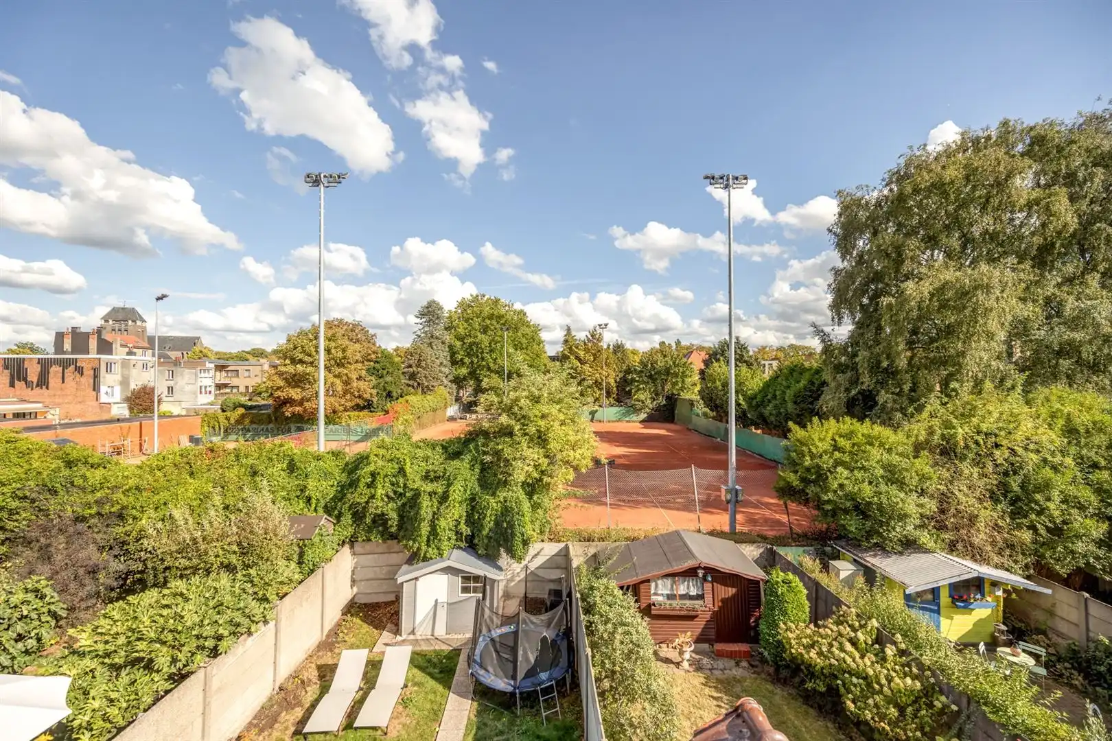 Tussen twee parken: licht appartement met tuin en garage foto 18
