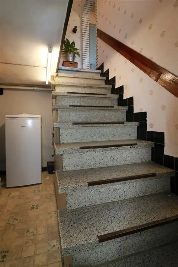 Gusting gelegen woning met 2 slpk, garage en tuin foto 22