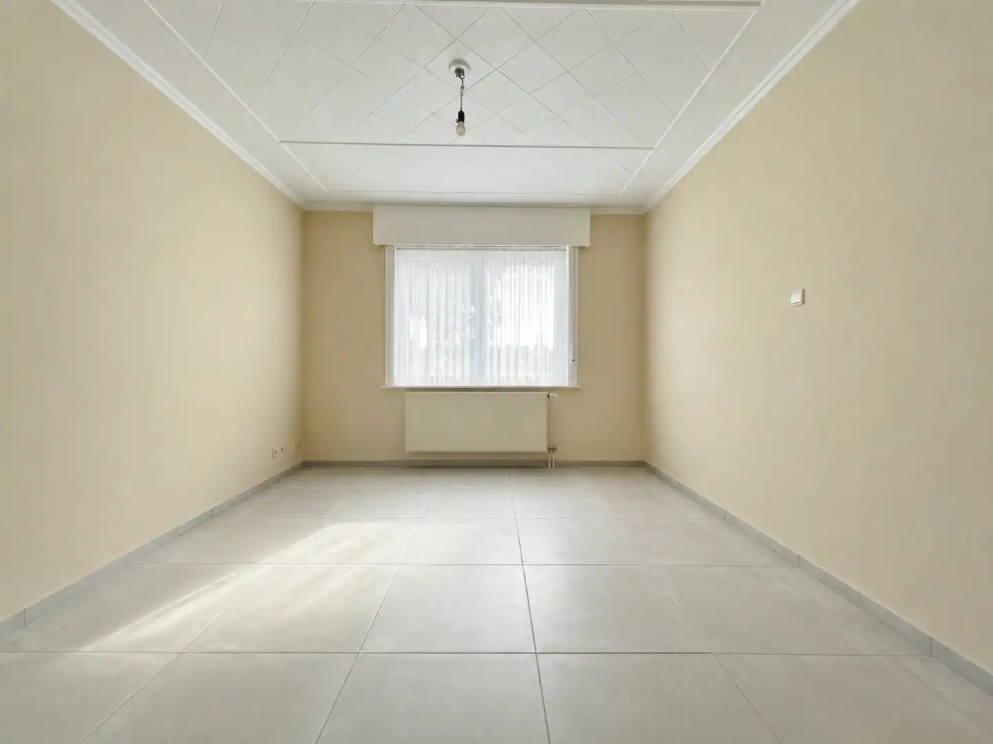 Centraal gelegen rijwoning met 4 slaapkamers en tuin.  foto 3