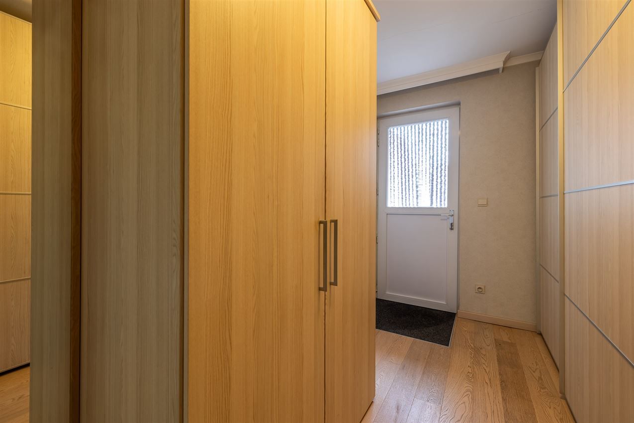 Verzorgd gebouw met handelszaak en 2 apt foto 8