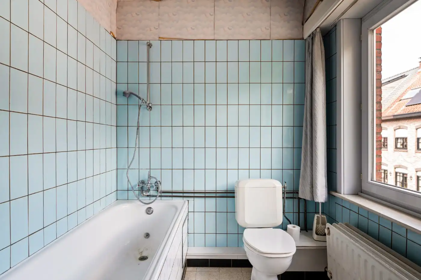 Te renoveren woning met 3 slpk., garage en tuintje foto 17