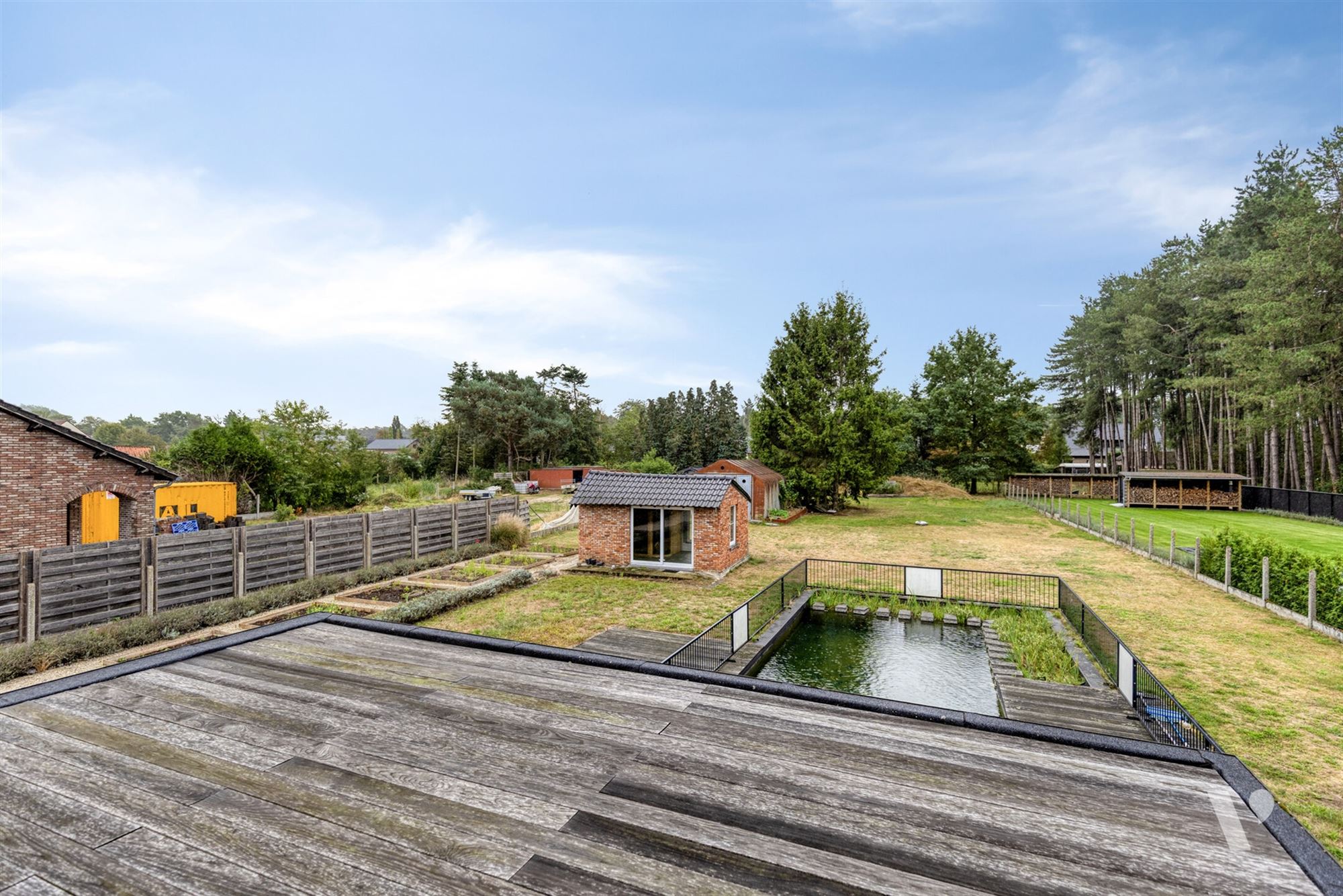 Prachtig gerenoveerde woning (279m²) met zwemvijver foto 21