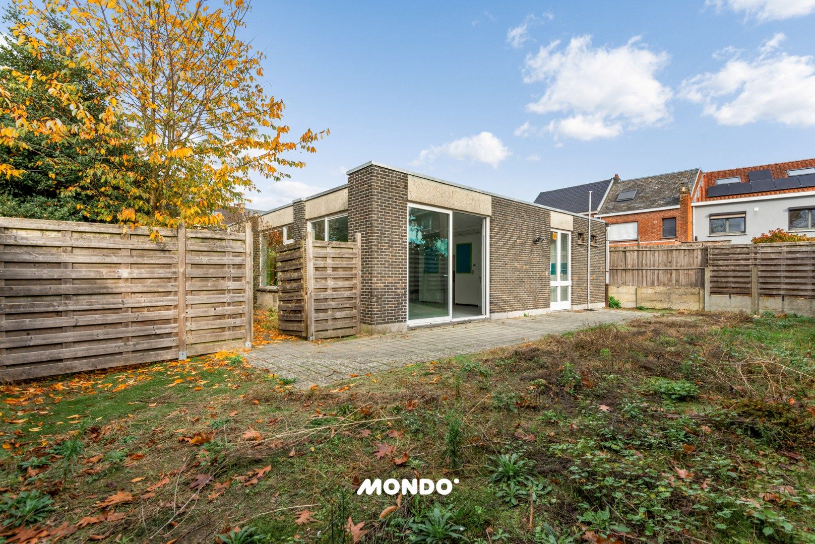 Veelzijdige praktijk- of kantoorruimte met tuin en terras nabij het centrum van Niel! foto 2