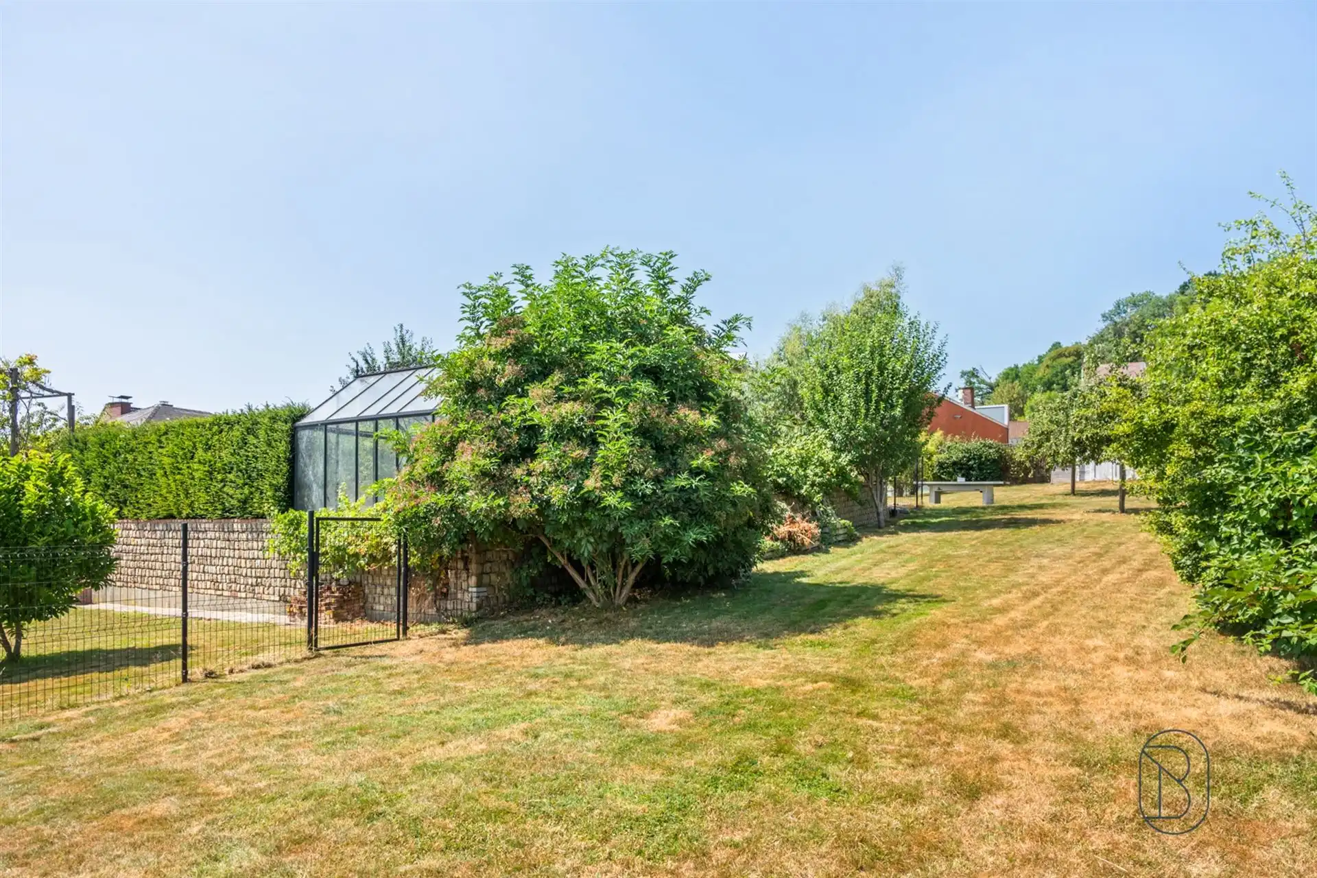 Ruime karakterwoning met 4 slk, grote tuin en charme. foto 8