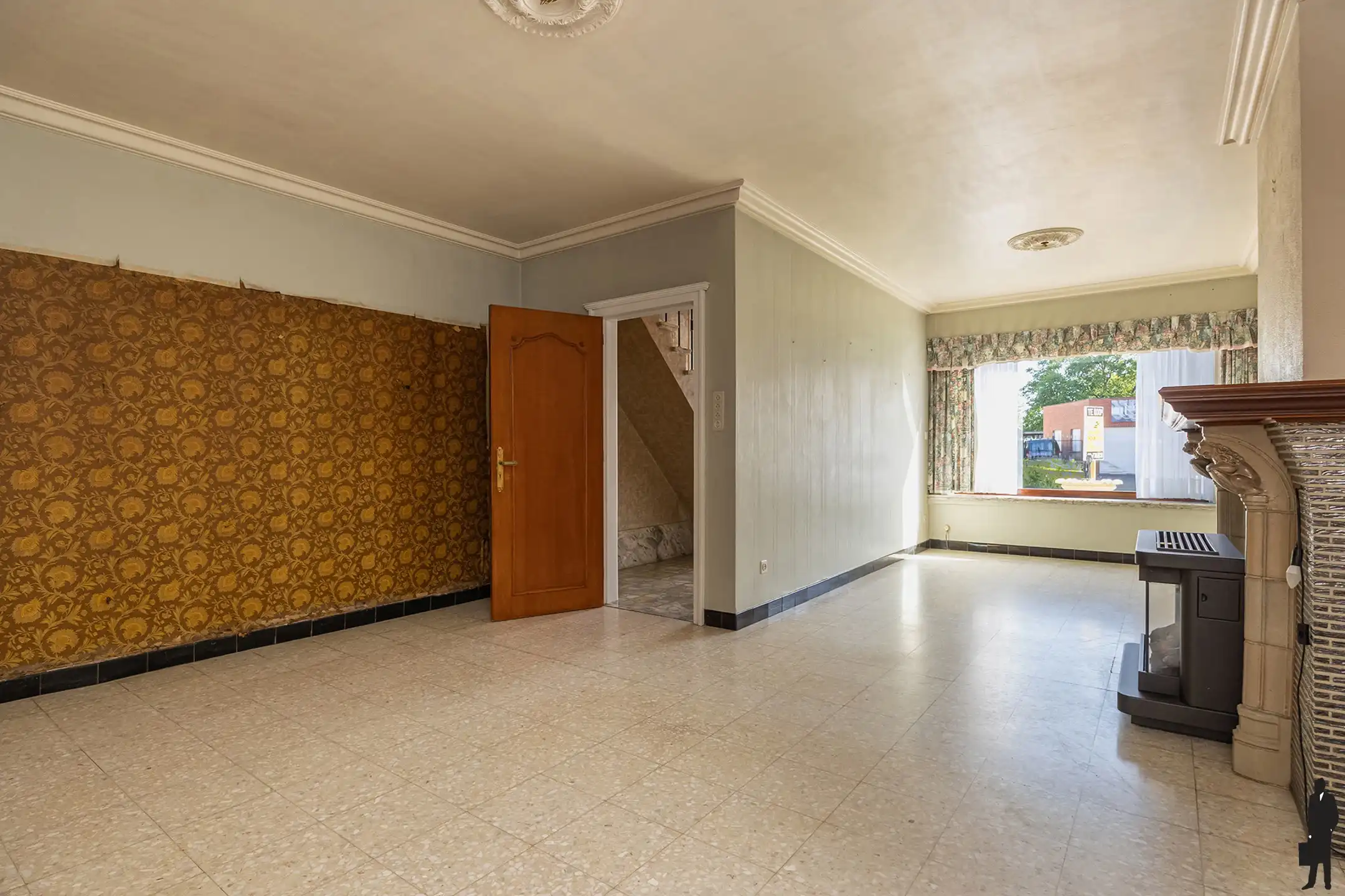 Ruime te renoveren gezinswoning met tuin te Sint-Niklaas foto 4