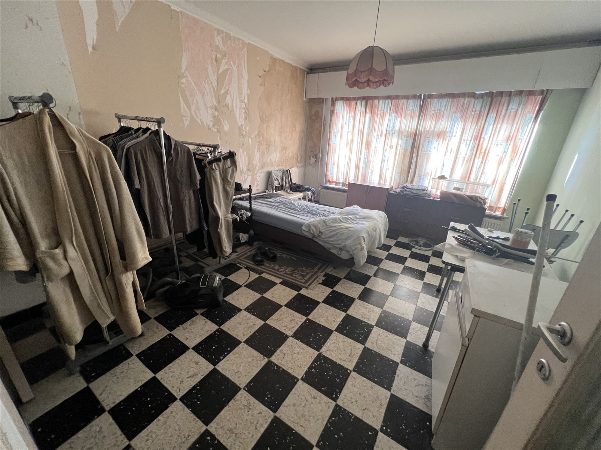 Opbrengsteigendom met 4 appartementen en tuin foto 25