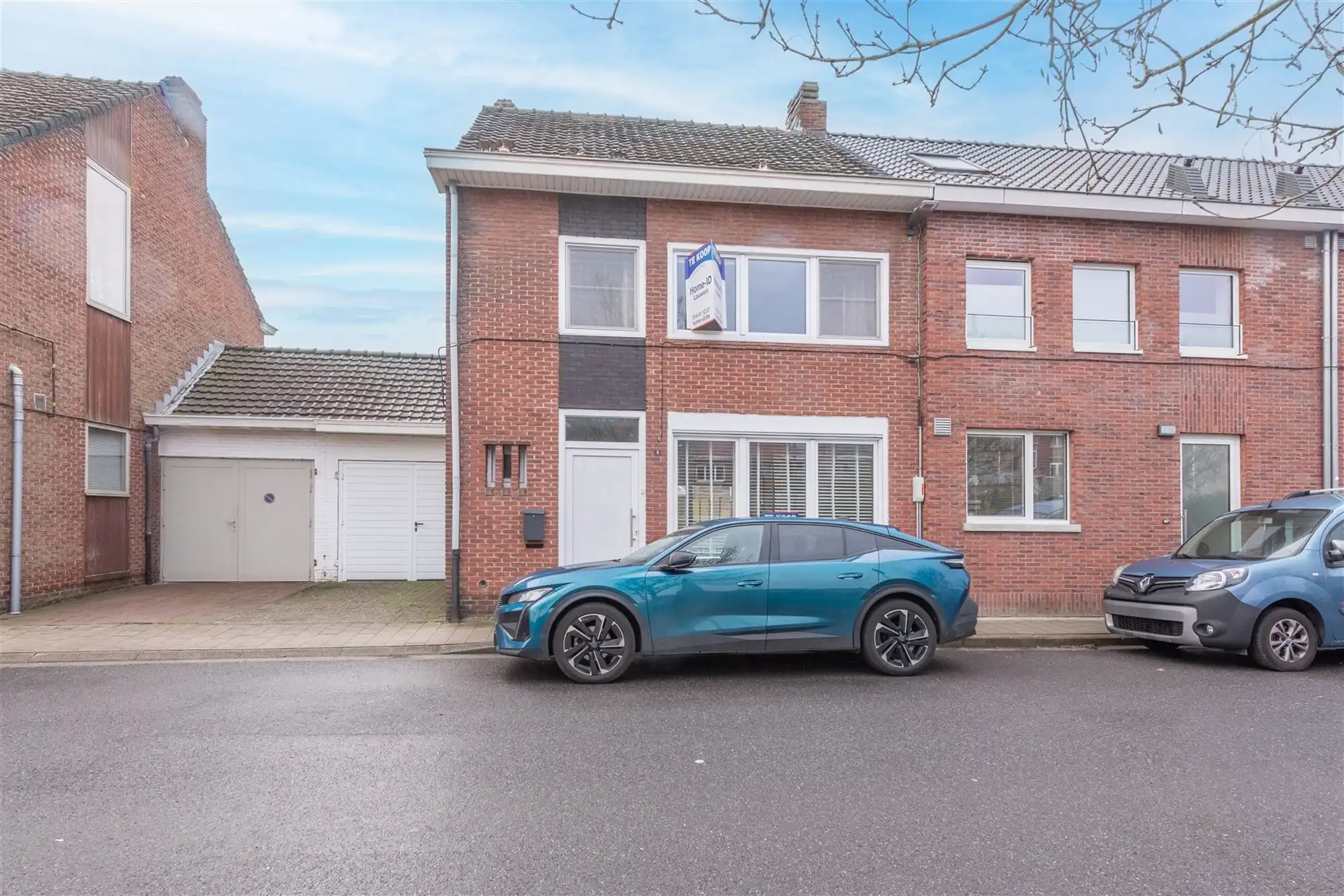 woning met 4 à 5 slaapkamers, leuke tuin en garage met oprit foto 2
