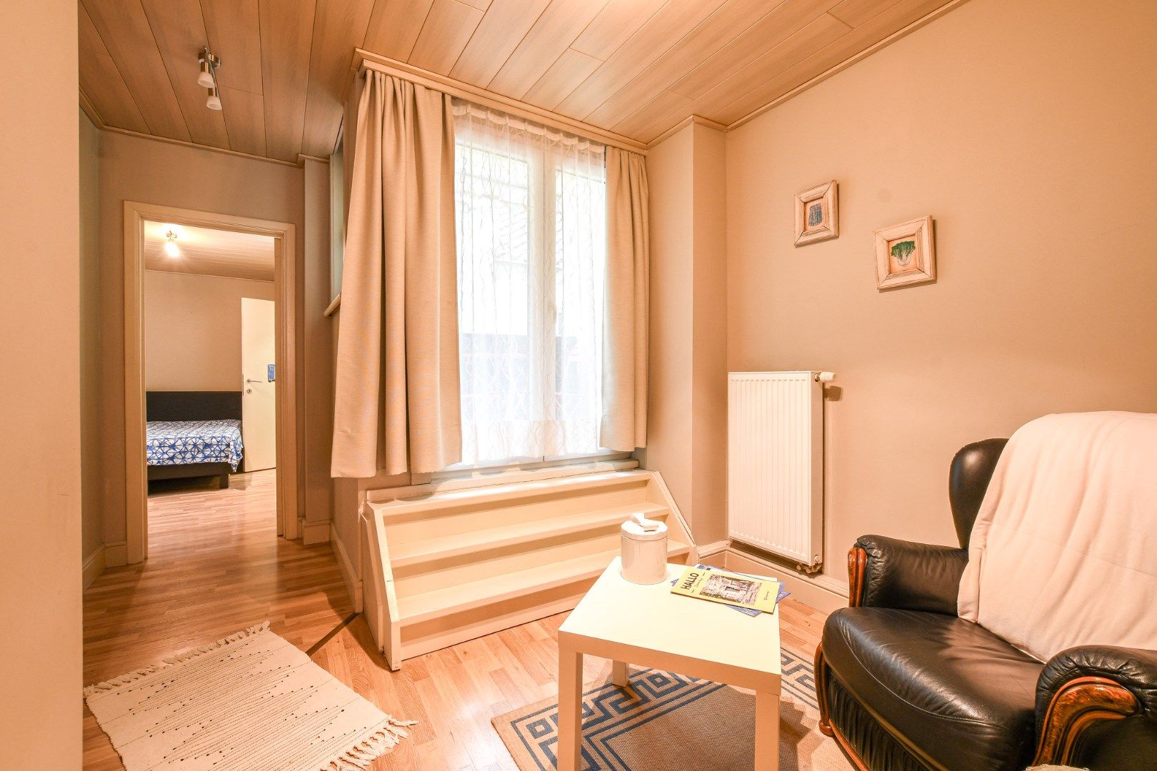 Opbrengsteigendom met 2 ruime appartementen en handelszaak op toplocatie! foto 11
