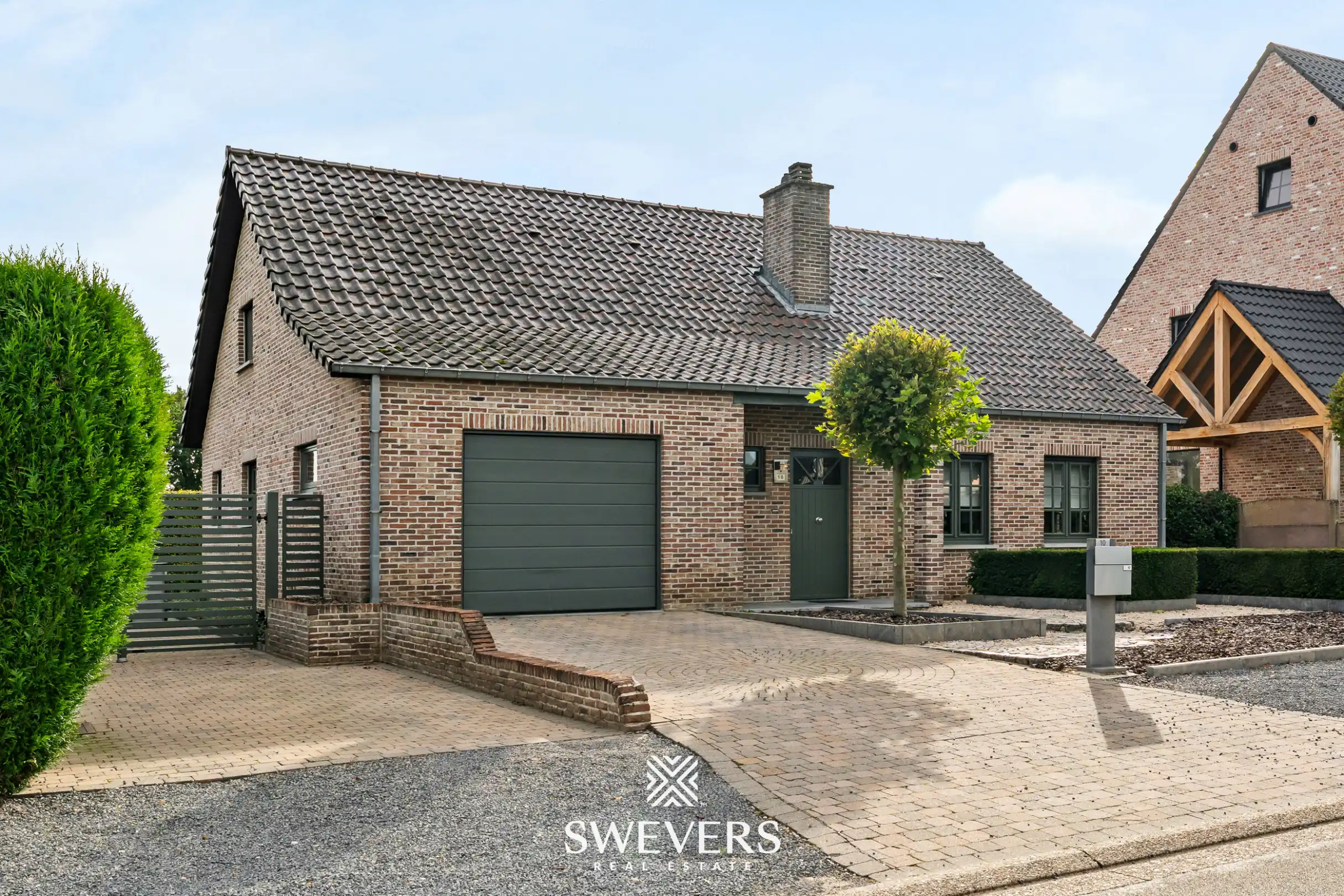 Energiezuinige instapklare gezinswoning met zuidgerichte tuin op een rustige ligging in Opglabbeek foto 2