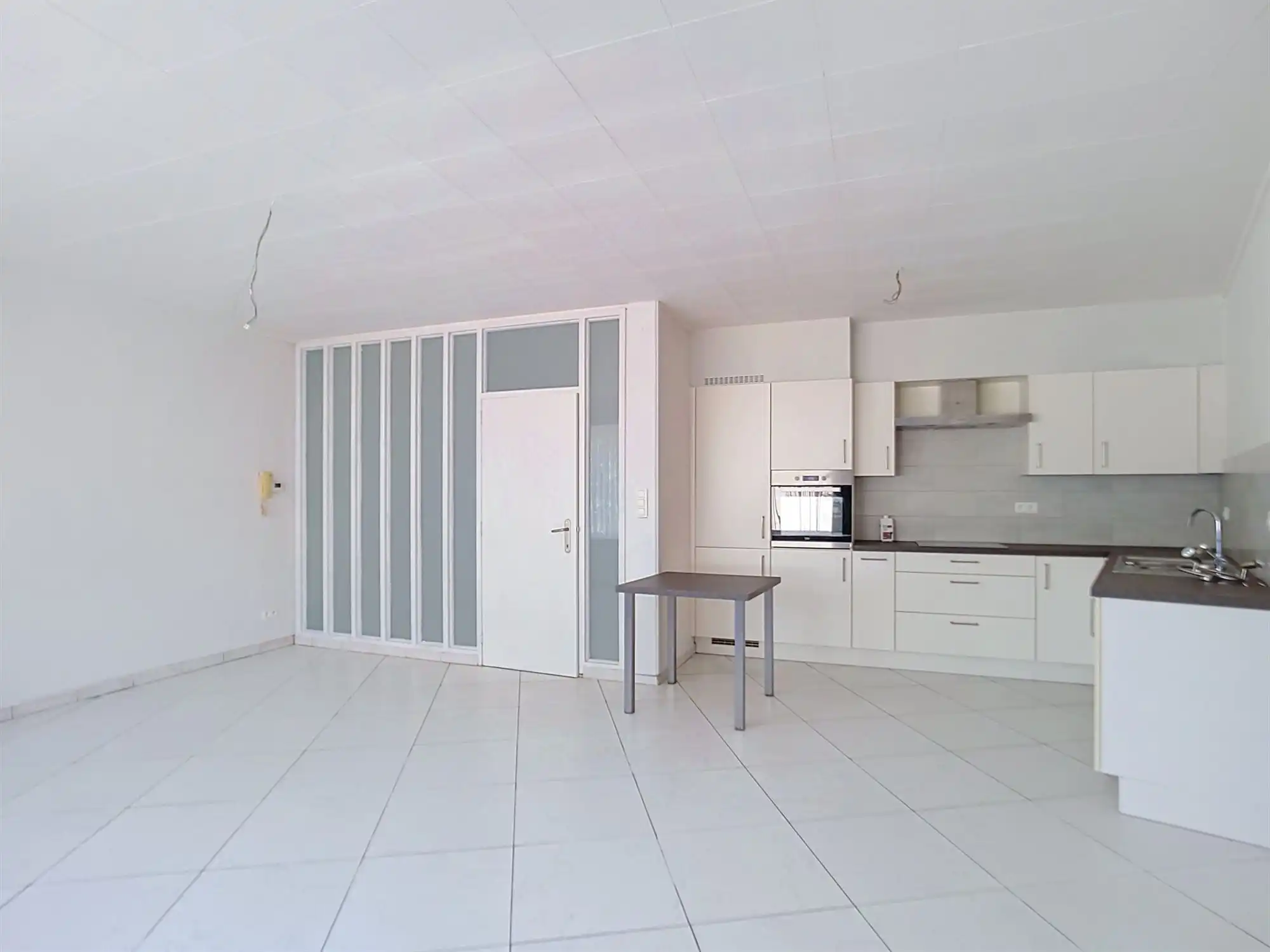 Gelijkvloers appartement met 2 slaapkamers, polyvalente ruimte en garage foto 2