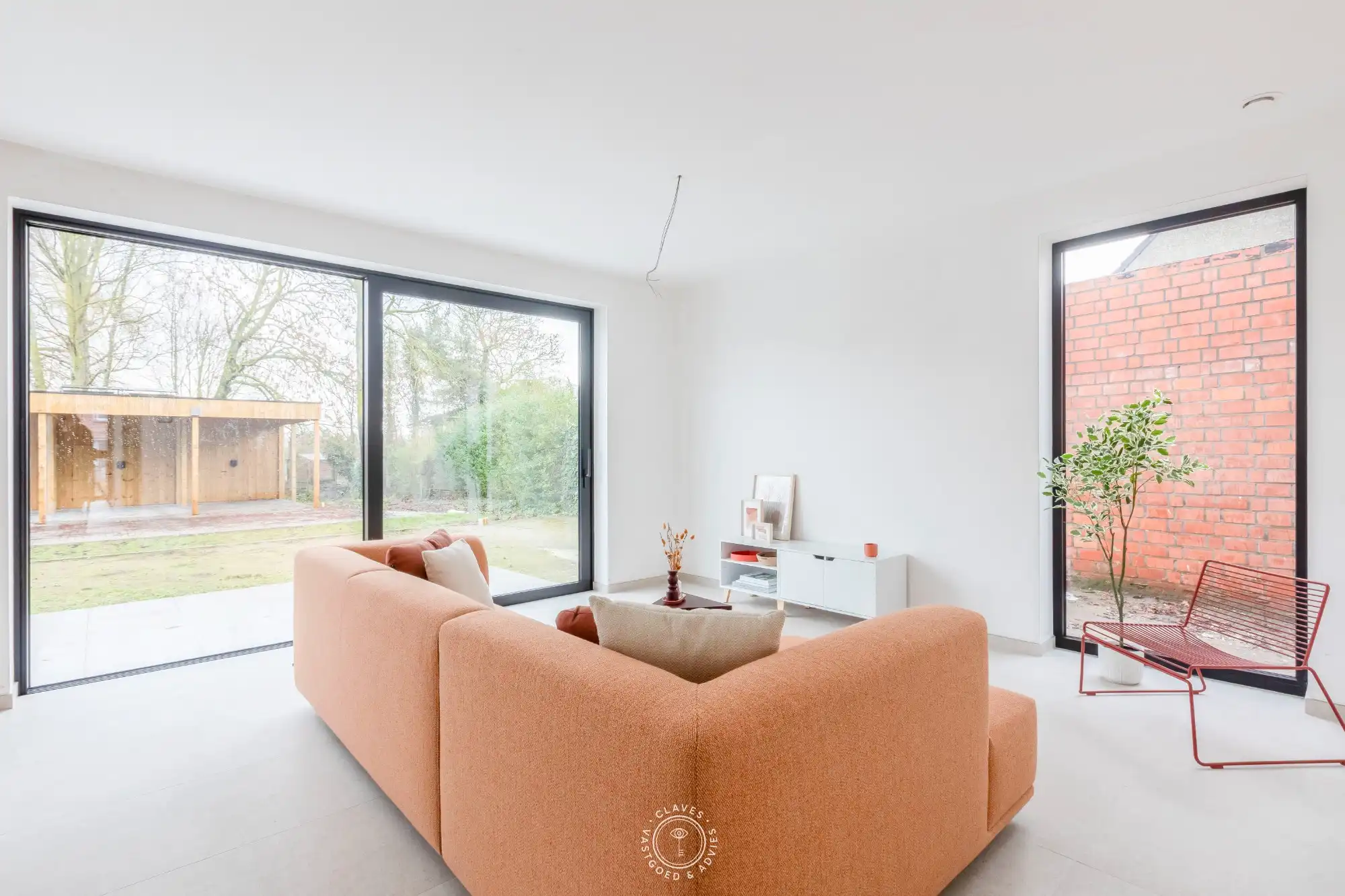 Grandioos gelijkvloers appartement met privatieve tuin foto 8