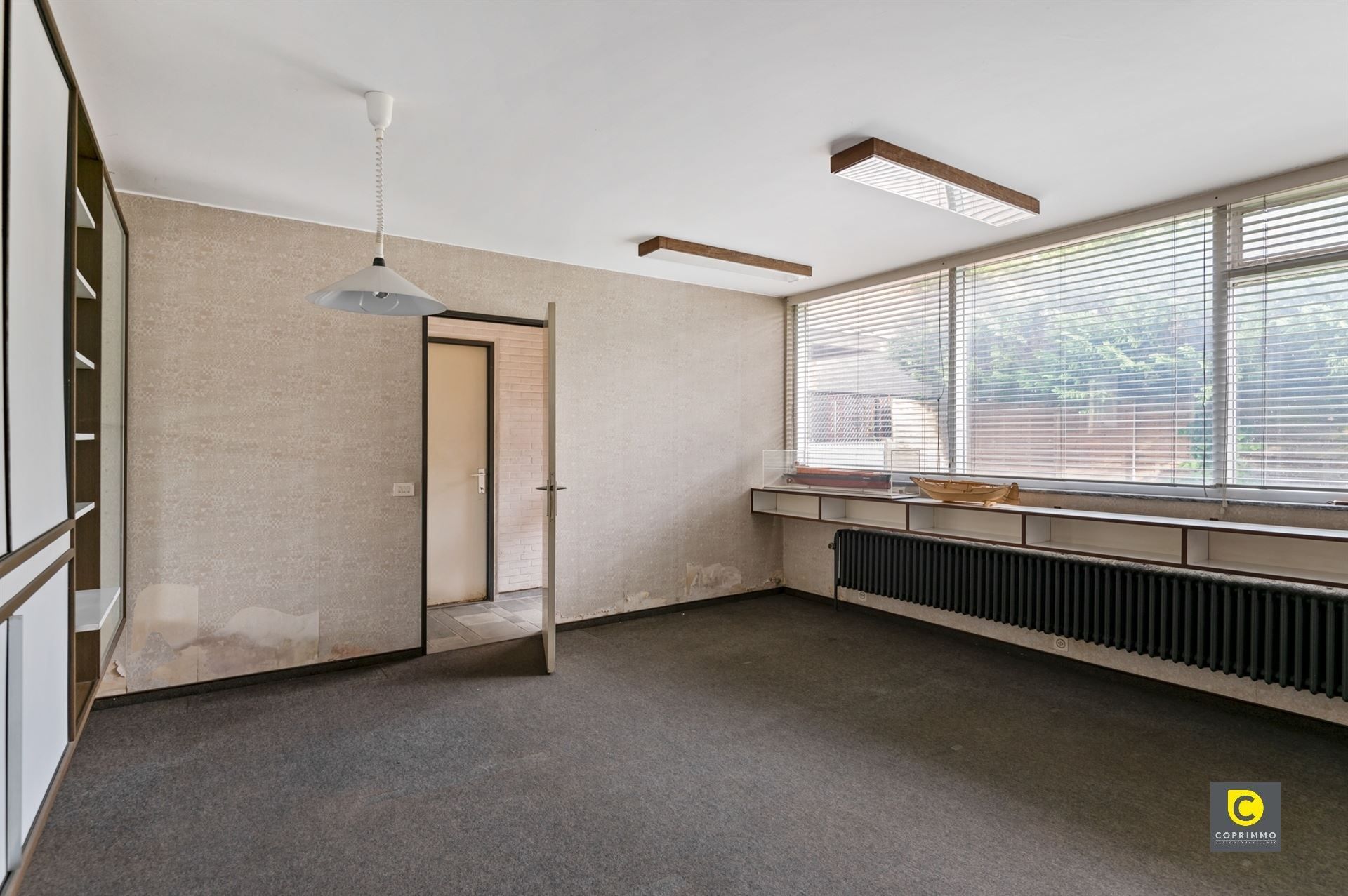 Ruime karakterwoning met tuin in Mortsel foto 6