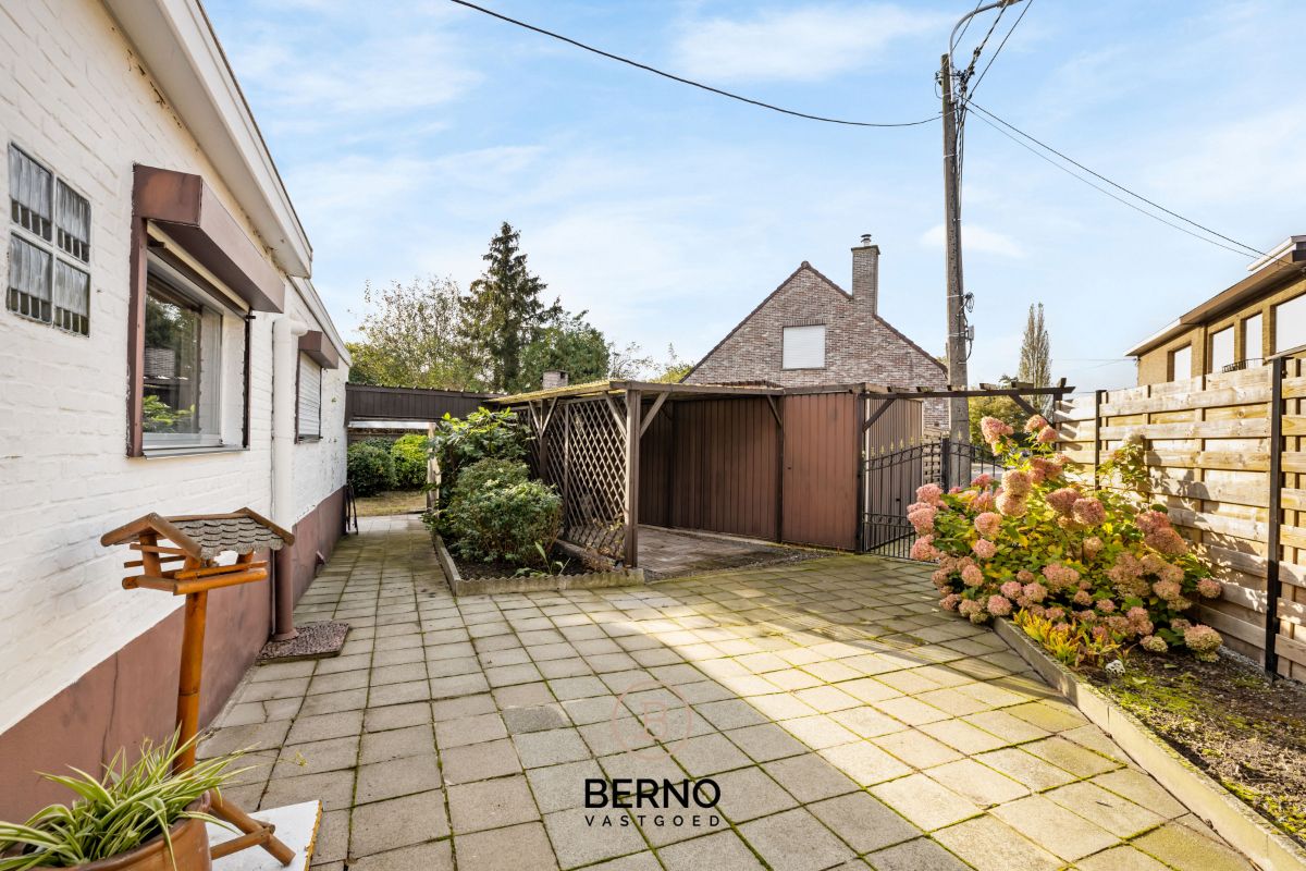Centraal gelegen woning met tuin en garage. foto 4