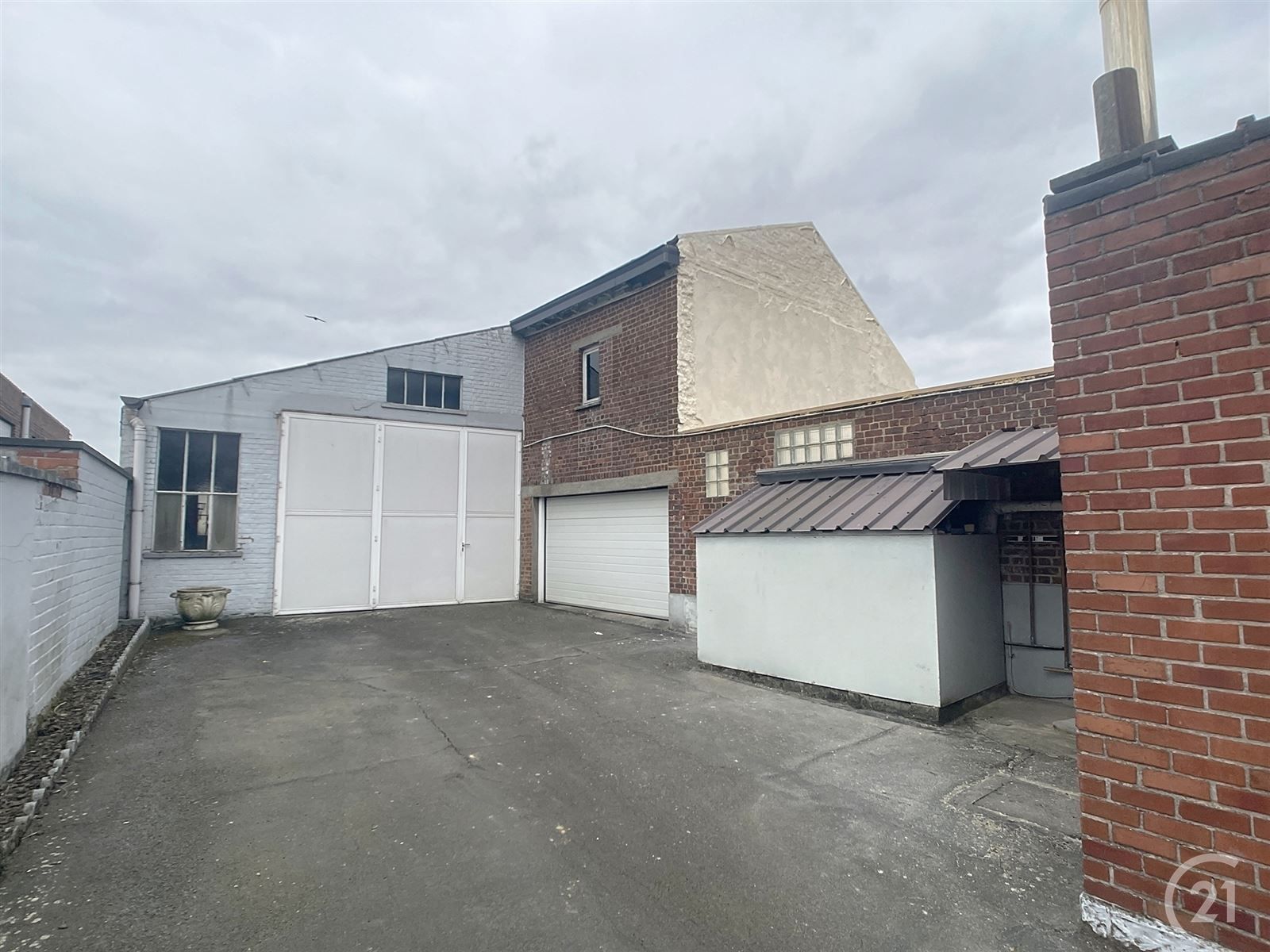 3 gevelwoning met loods (248m2) en garage foto 22
