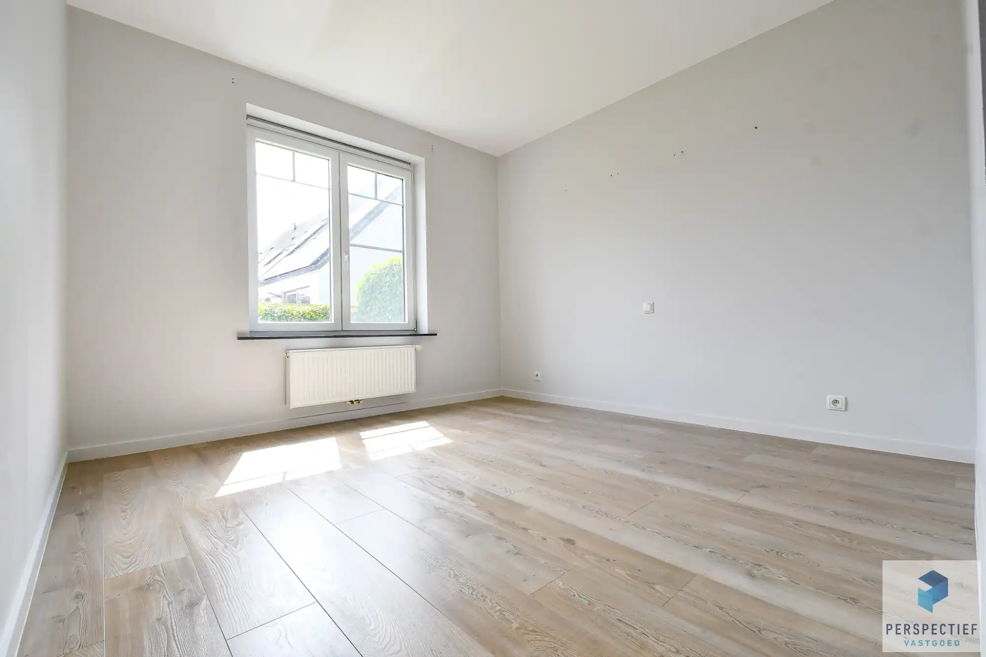 BEZOEKMOMENT WOENSDAG 15/07 VAN 16.30U TOT 17.30U | Ruim gelijkvloers appartement met 2 slaapkamers, voor- én achtertuin met terras & staanplaats foto 15