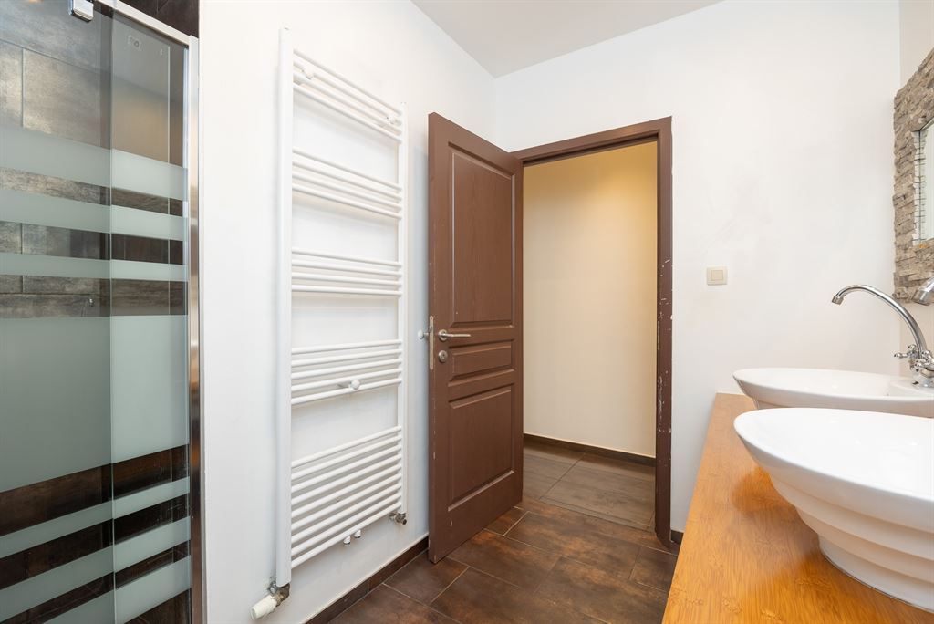 Gelijkvloers appartement met zonnige tuin foto 10