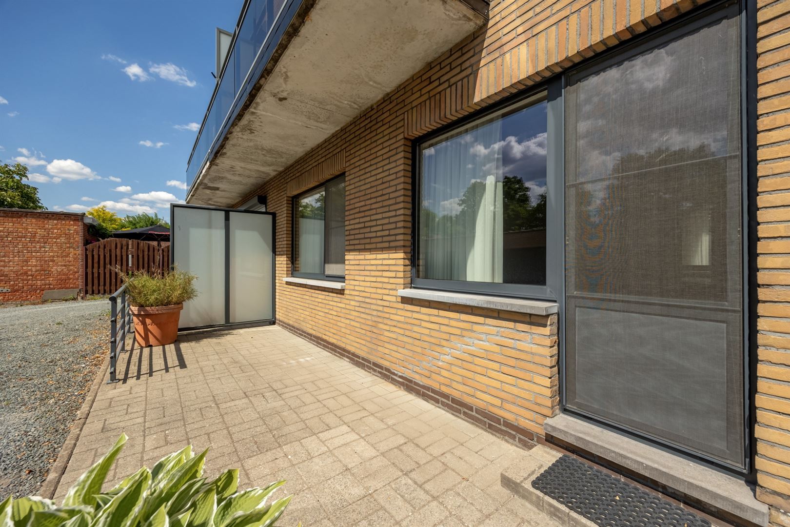 Lichtrijk gelijkvloers appartement met XXL-garage! foto 12