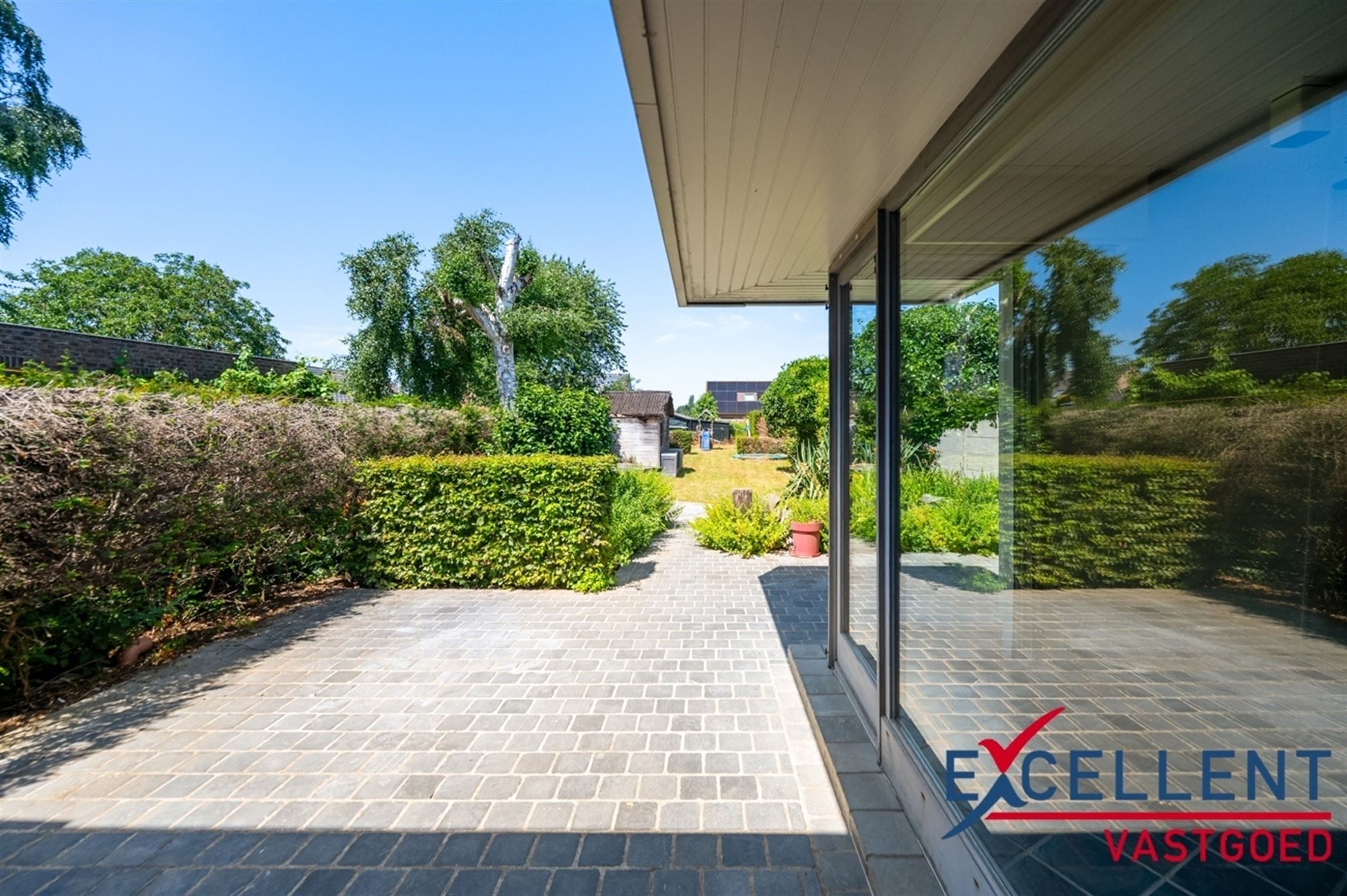Charmante woning met prachtige tuin en bijhorend handelspand  foto 15