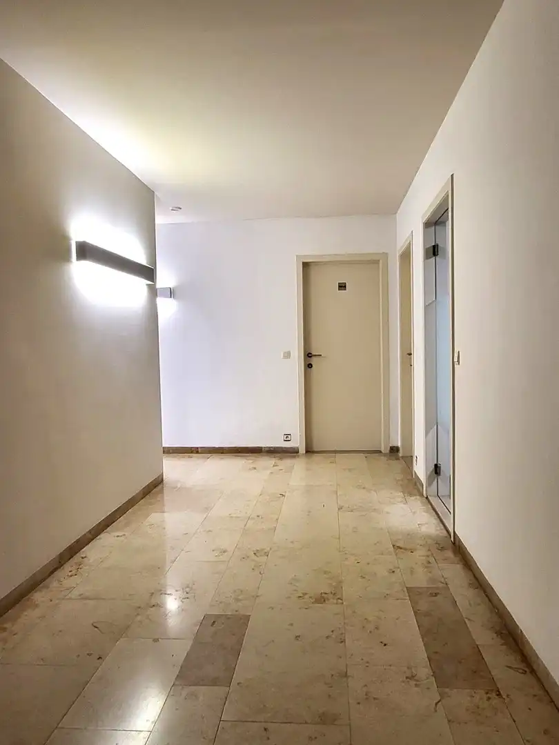 Exclusief wonen & ondernemen: imposante villa met volwaardige praktijk en aparte toegang op commerciële topligging, een perceel van 1.139 m² en met maar liefst 532 m² bewoonbare oppervlakte. foto 33