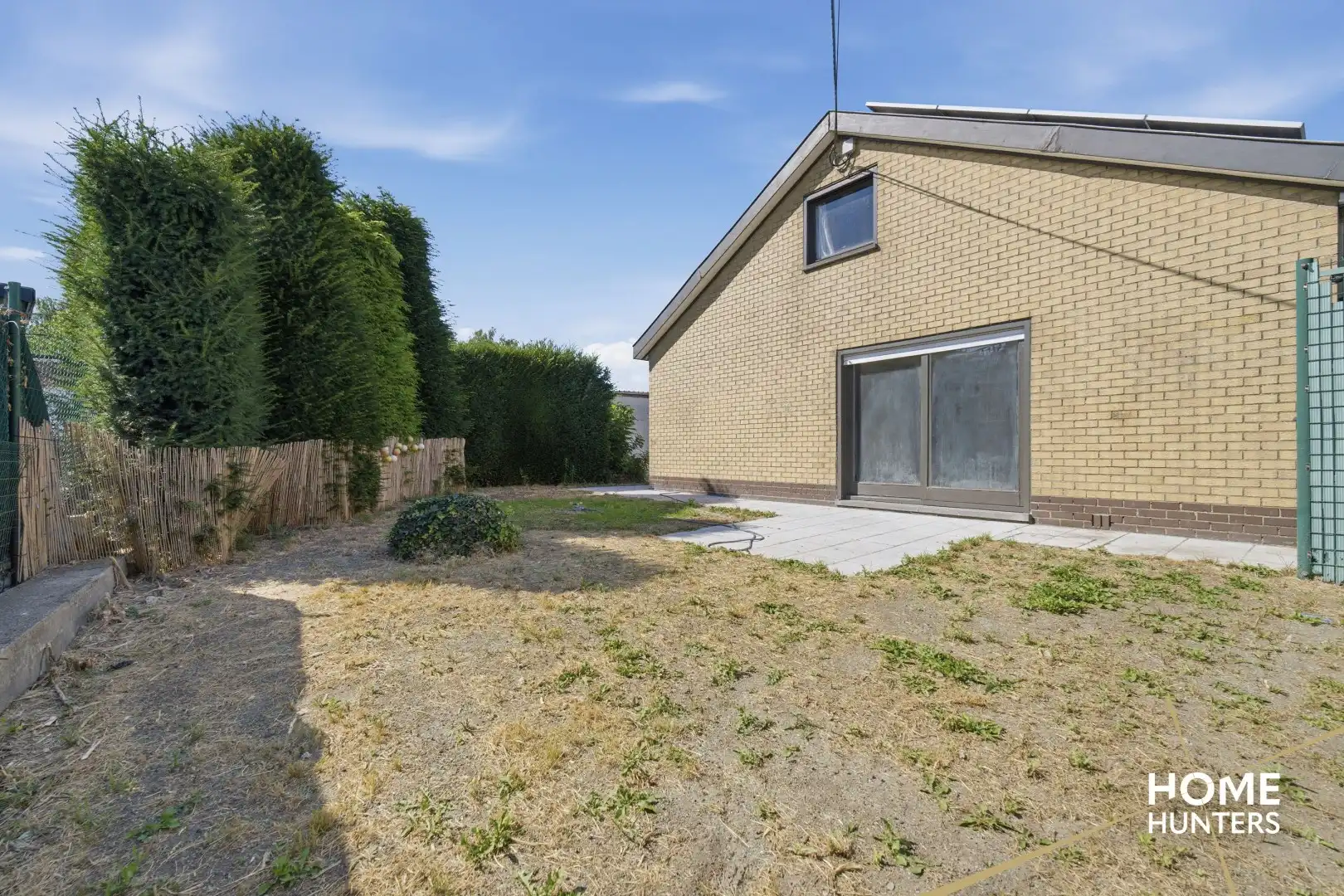 Te renoveren woning met ruime garage en tuin op centrale ligging te Zwevegem foto 5