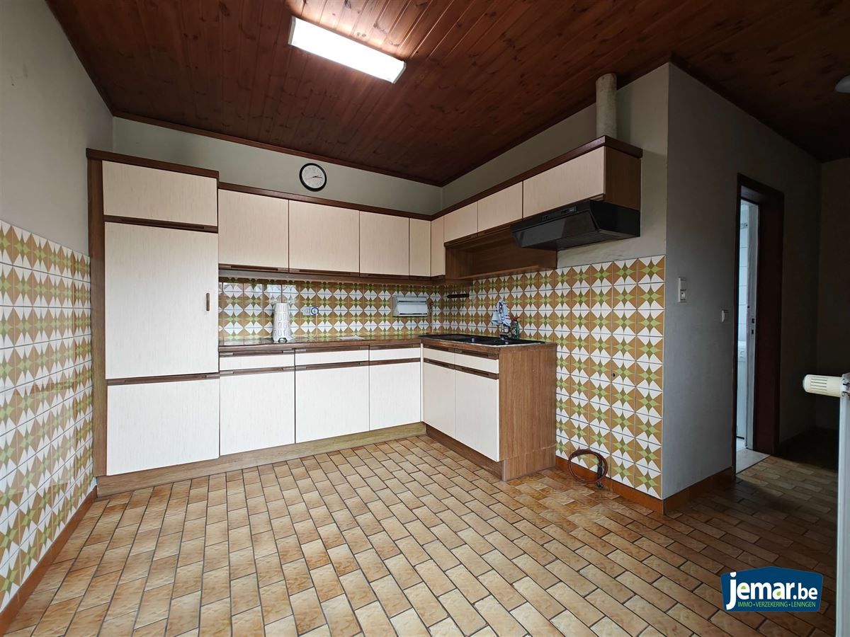 Instapklare woning met 4 slaapkamers en garage  foto 3