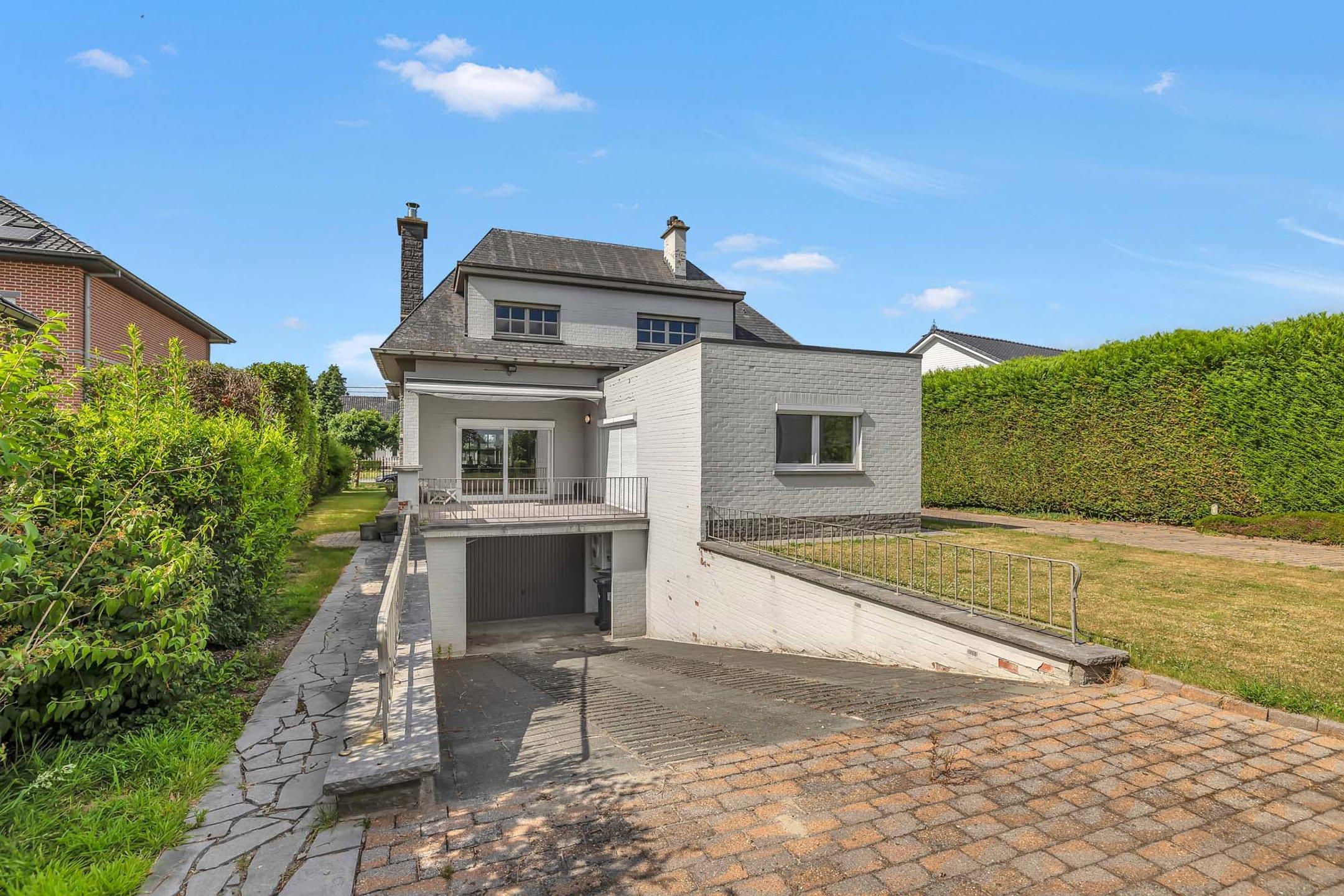 Prachtige villa met achterliggende loods van +/- 200m² foto 25