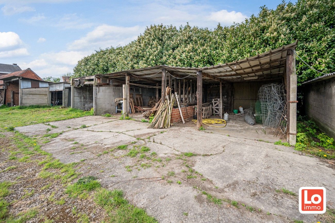 Landelijk gelegen halfopen woning met verschillende stallingen op groot perceel grond met open zicht in Zeveneken! foto 29