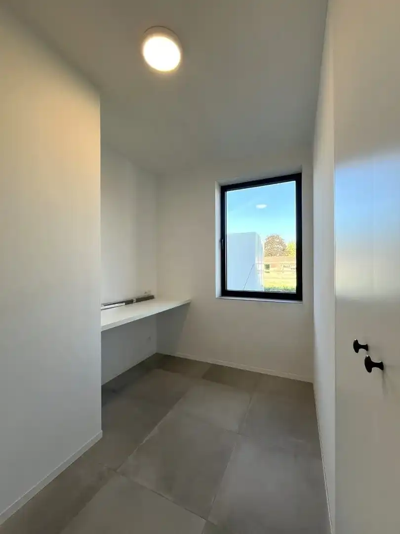 Beselare – Gelijkvloers nieuwbouwappartement met tuin en oprit foto 8