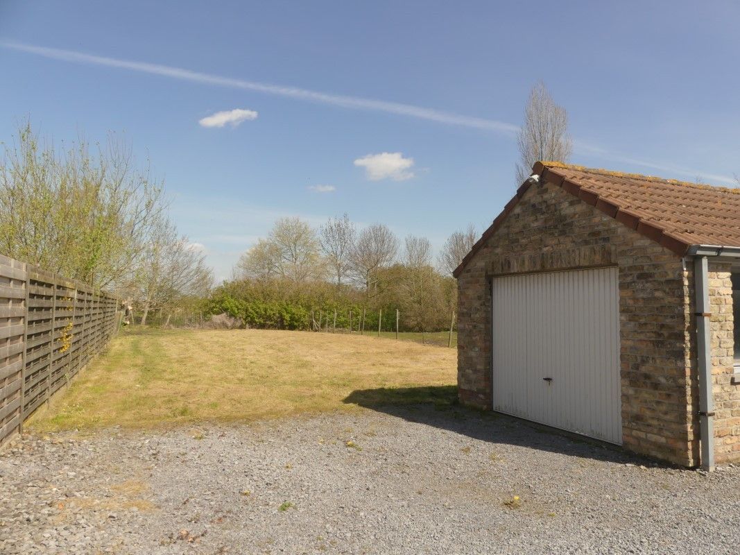 Instapklare gezinswoning met afzonderlijke garage en tuin foto 14