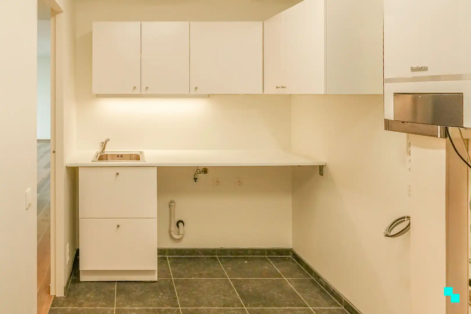 Tweeslaapkamer appartement op het gelijkvloers in het hart van Merelbeke foto 13