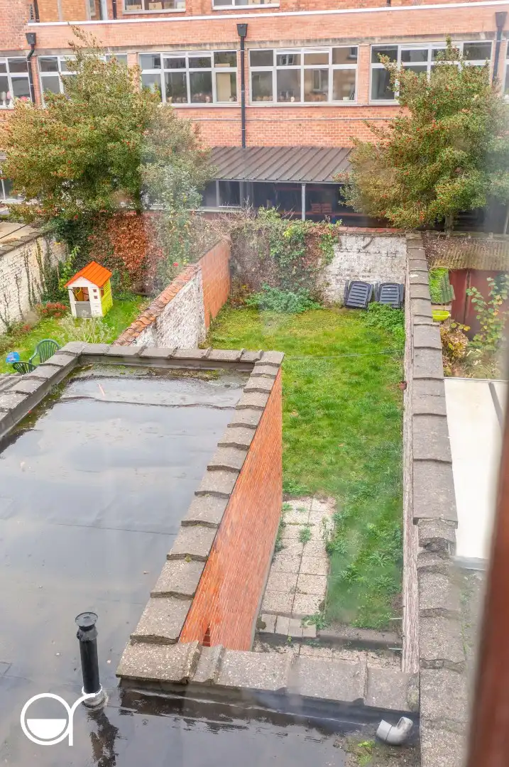 Opbrengsteigendom met 2 appartementen gelegen vlakbij het Sint-baafskouterpark & Rozebroeken.  foto 4