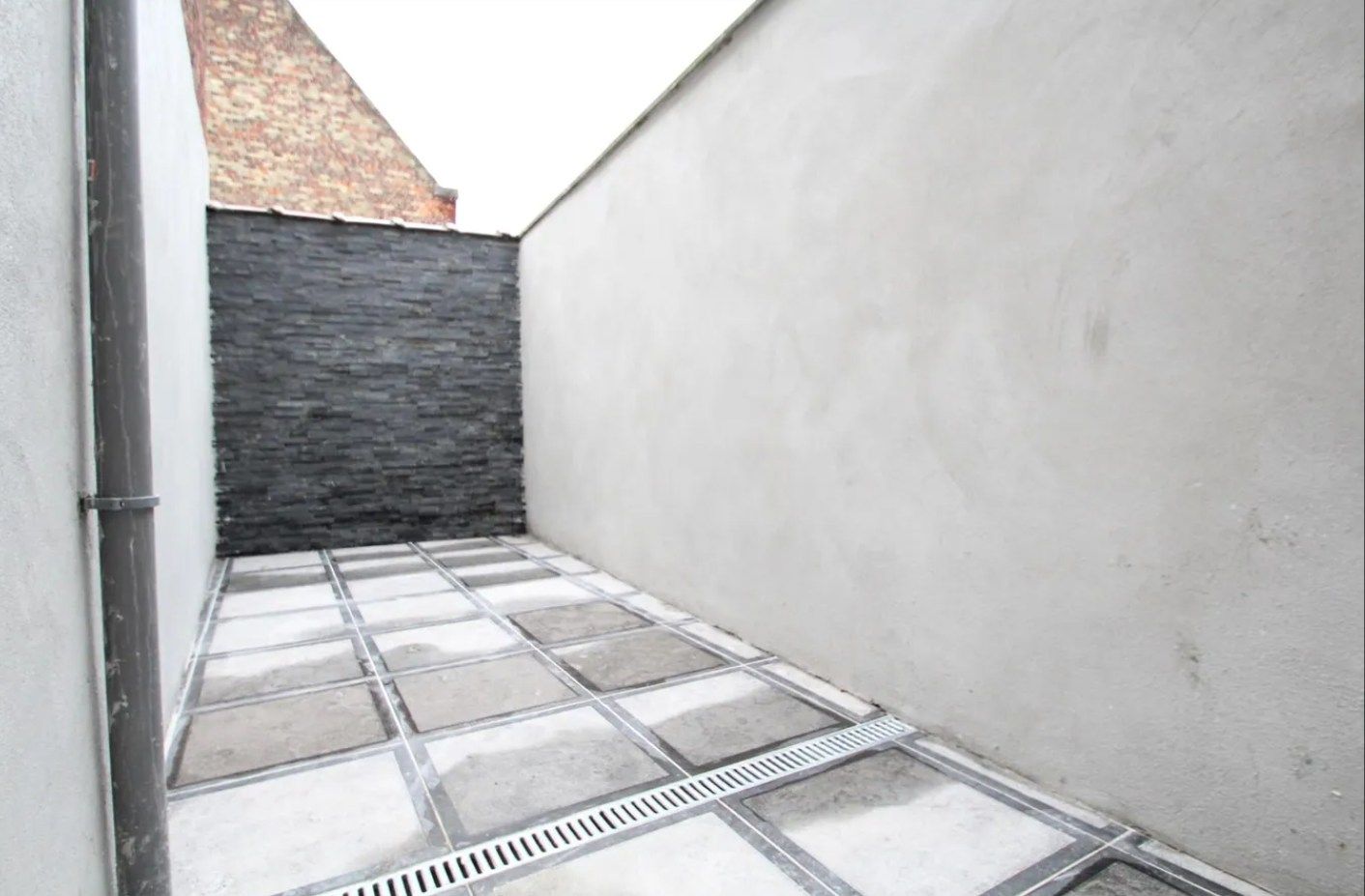 WONING MET 2 SLAAPKAMERS EN TERRAS IN CENTRUM foto 2