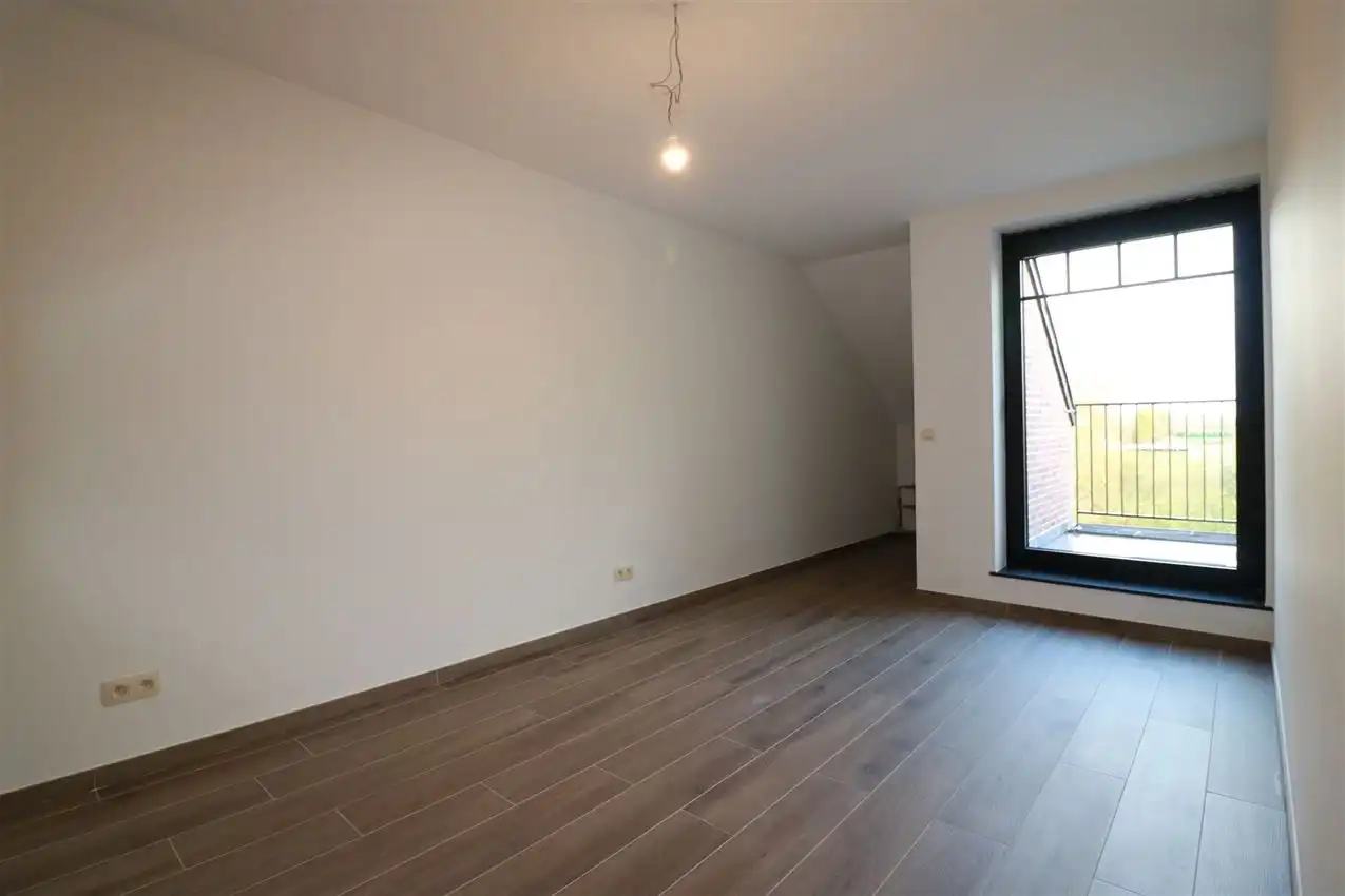 Unieke duplex met twee slpk, terras, autostaanplaats foto 17