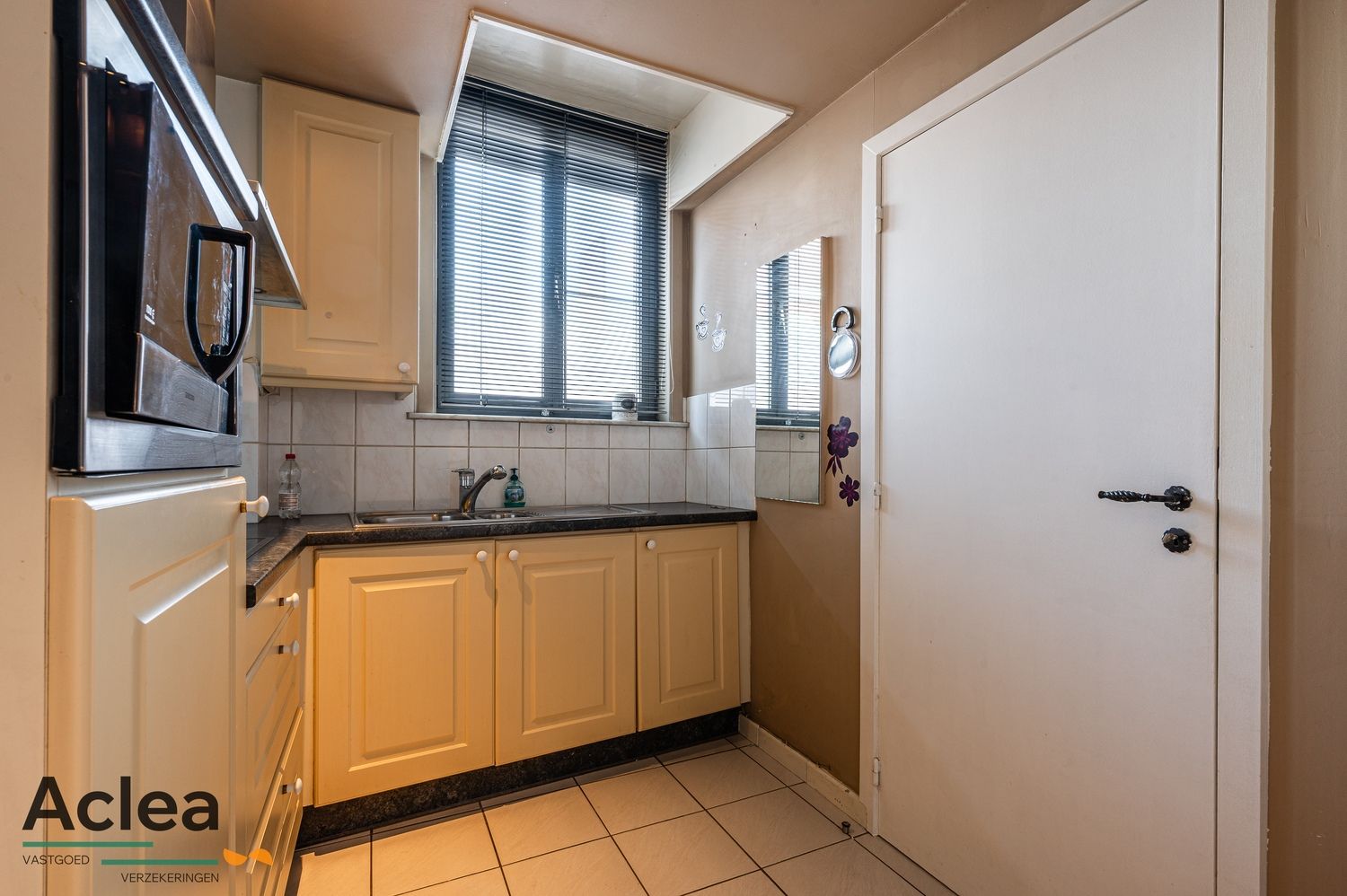 Centraal gelegen gelijkvloers hoekappartement foto 4