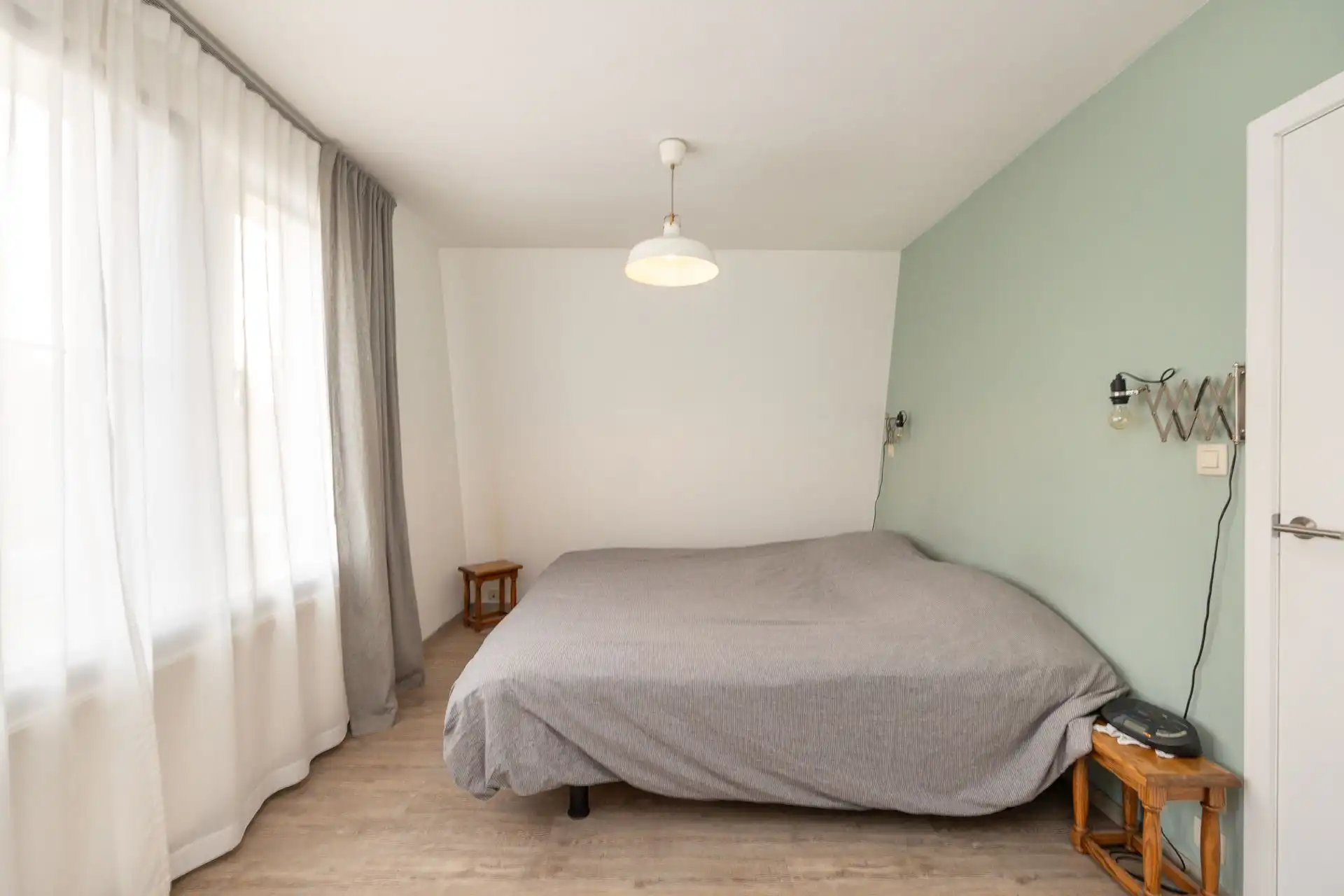 Sfeervolle gezinswoning met zonnige tuin in Mortsel foto 13